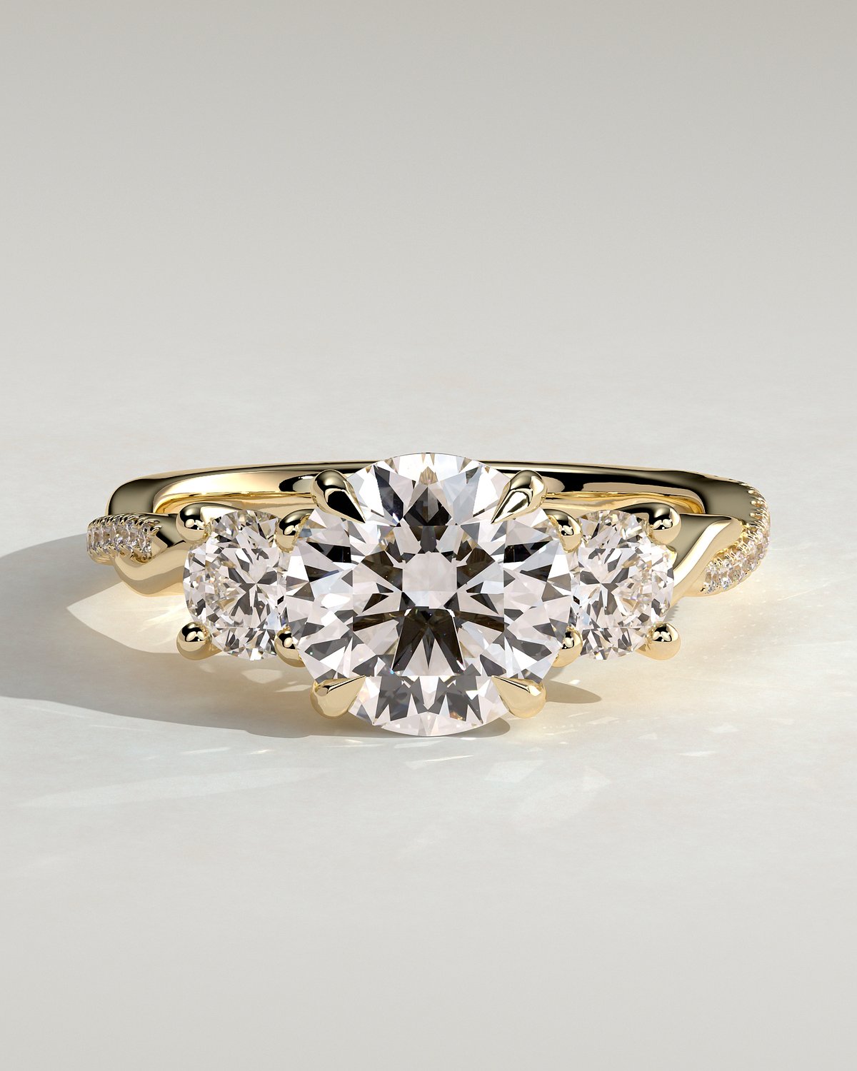 Jaylene - Round Trilogy with Twisted Band - 18k Yellow Gold