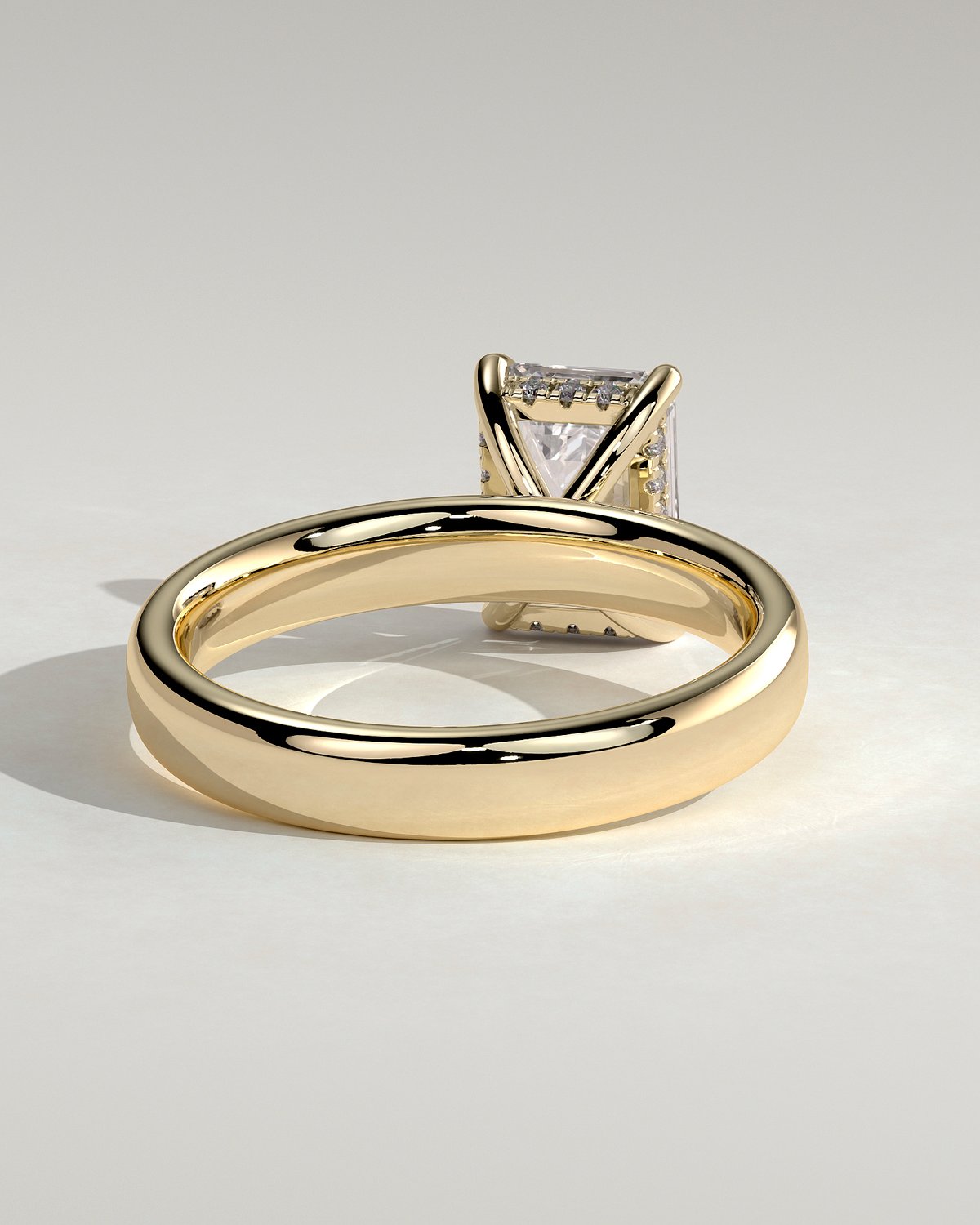 Kate - Emerald Solitaire with Cigar Band - 18k Yellow Gold High Setting