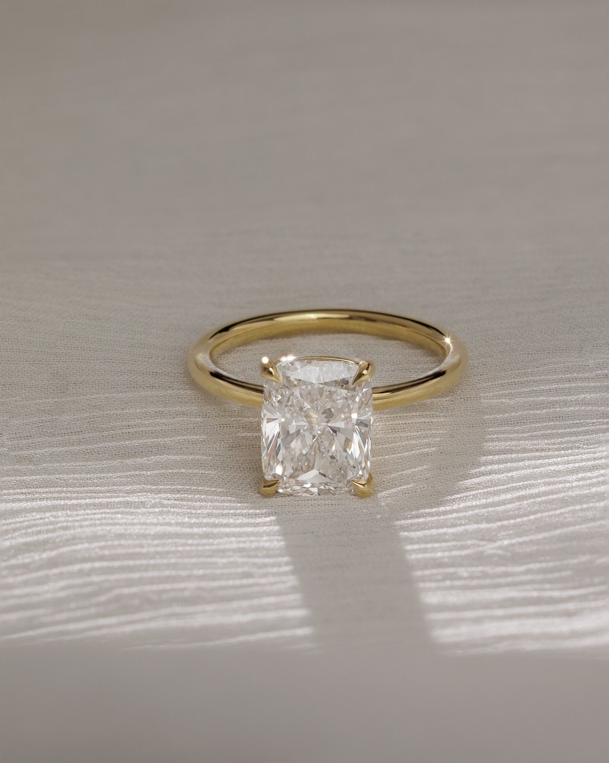 Leonora - Elongated Cushion Solitaire Lifestyle Image