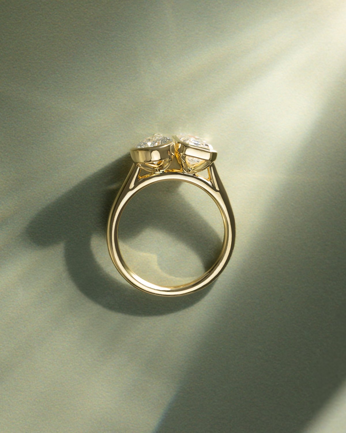 Margot - Bezel Set Pear and Emerald Toi Et Moi Lifestyle Image