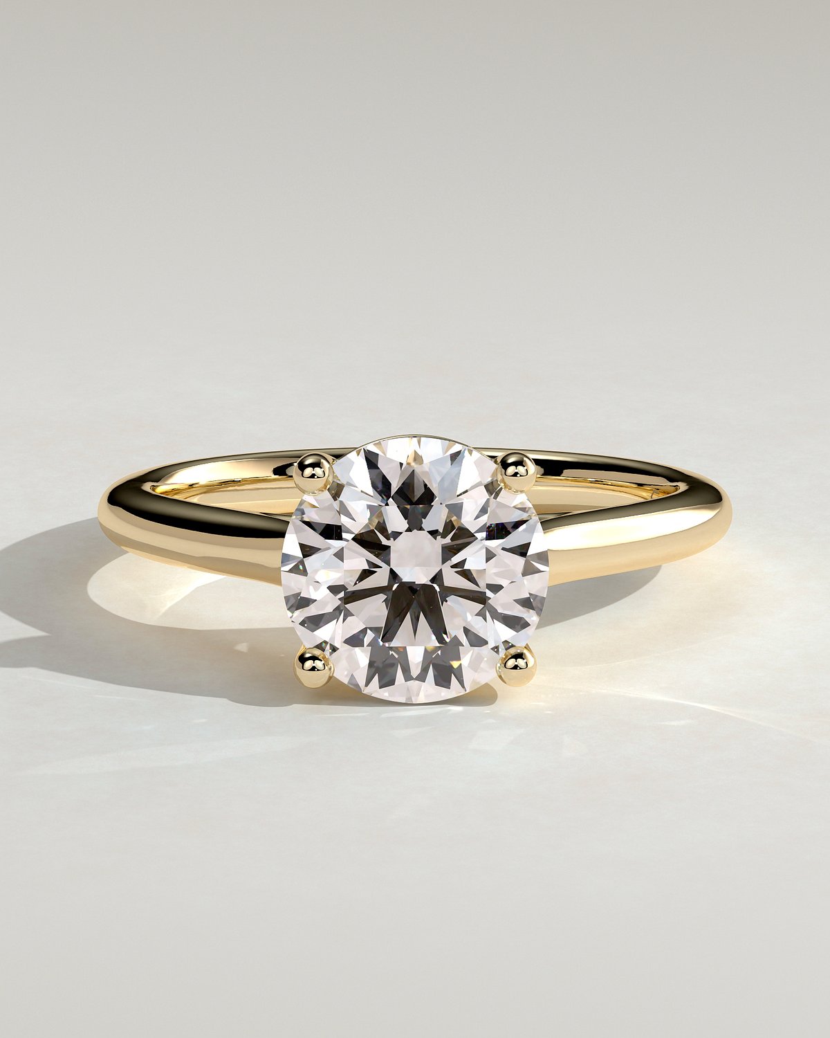 Noelle - 4 Claw Cathedral Round Solitaire - 18k Yellow Gold