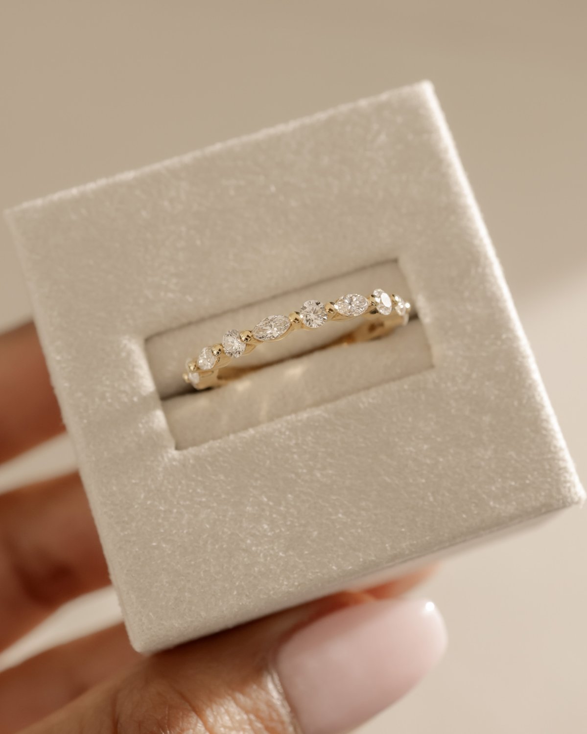 Odette - Round and Marquise Accent Stones Wedding Ring Lifestyle Image