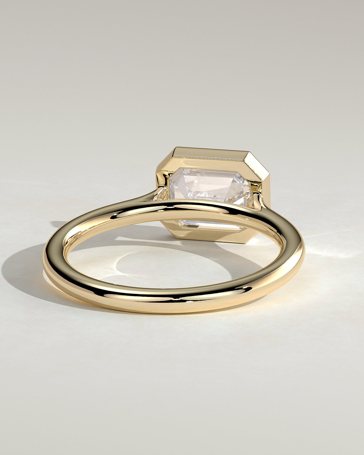 Olive - East West Emerald Solitaire with Cathedral Bezel Setting - 18k Yellow Gold