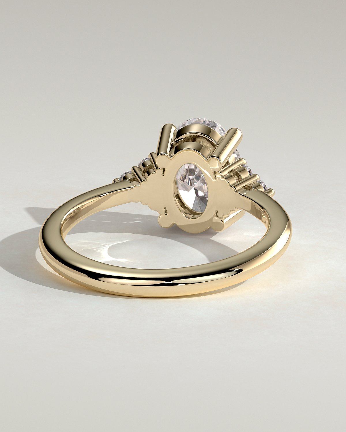 Sharon - 4 Claw Oval with Accent Stones - 18k Yellow Gold