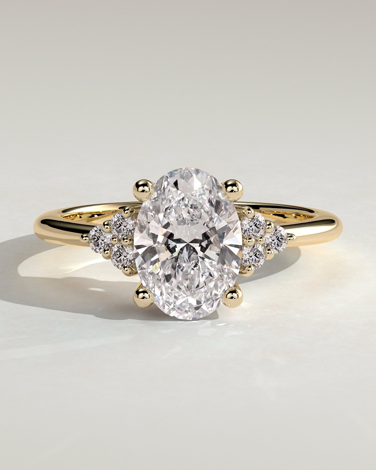 Sharon - 4 Claw Oval with Accent Stones - 18k Yellow Gold