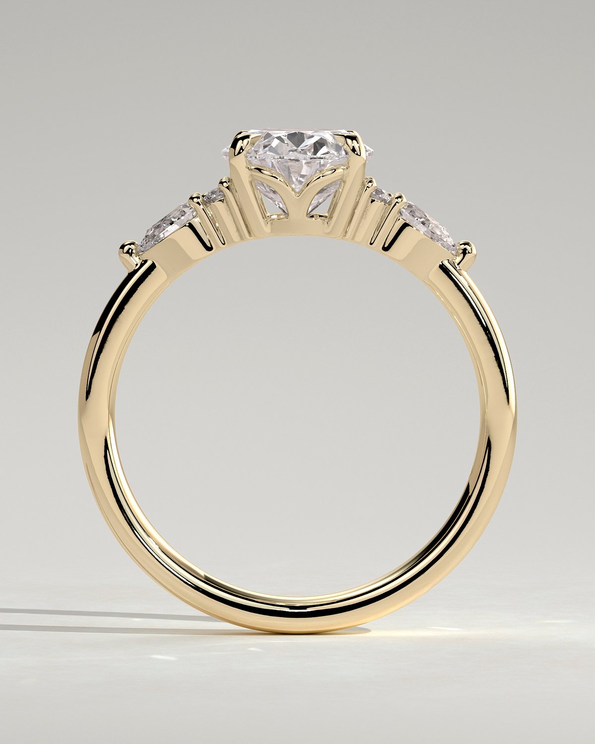 Sheridan  Oval Trilogy with Round and Pear Stones - 18k Yellow Gold Low Setting