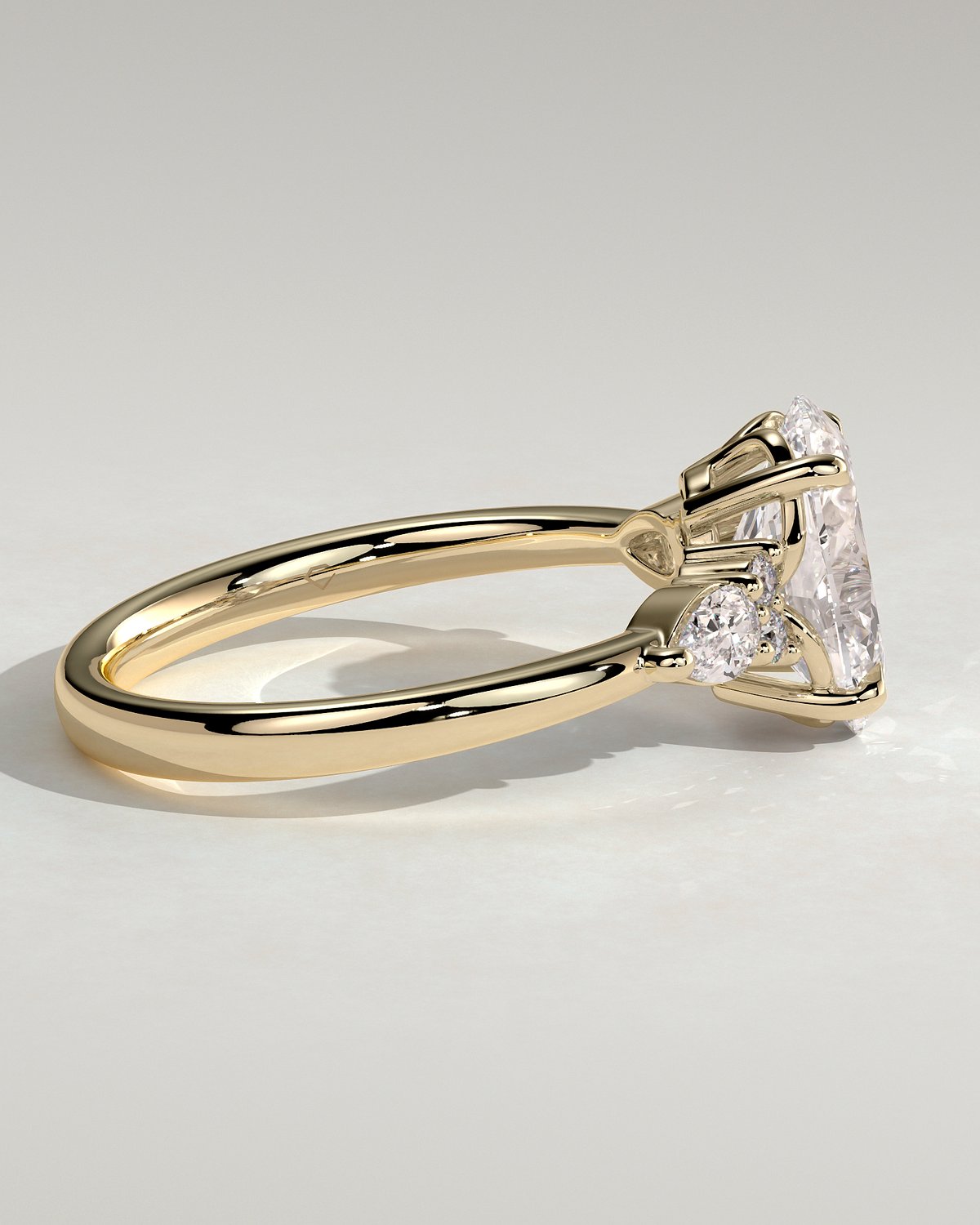 Sheridan  Oval Trilogy with Round and Pear Stones - 18k Yellow Gold Low Setting