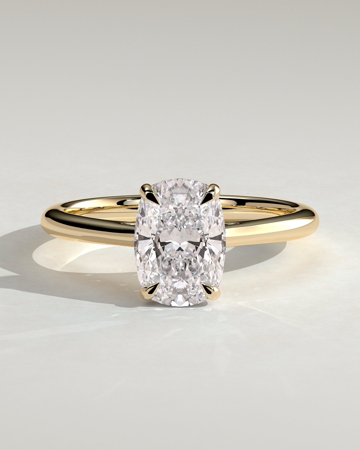 Wendy - 4 Claw Elongated Cushion Solitaire - 18k Yellow Gold
