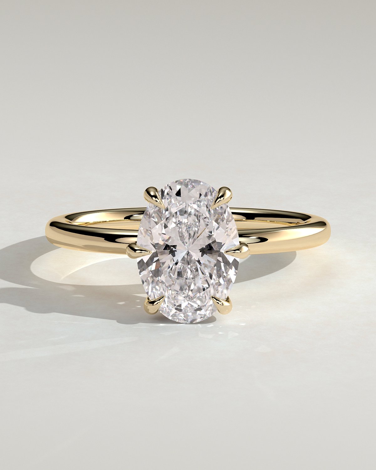 Wilma - Six Claw Oval Solitaire - 18k Yellow Gold