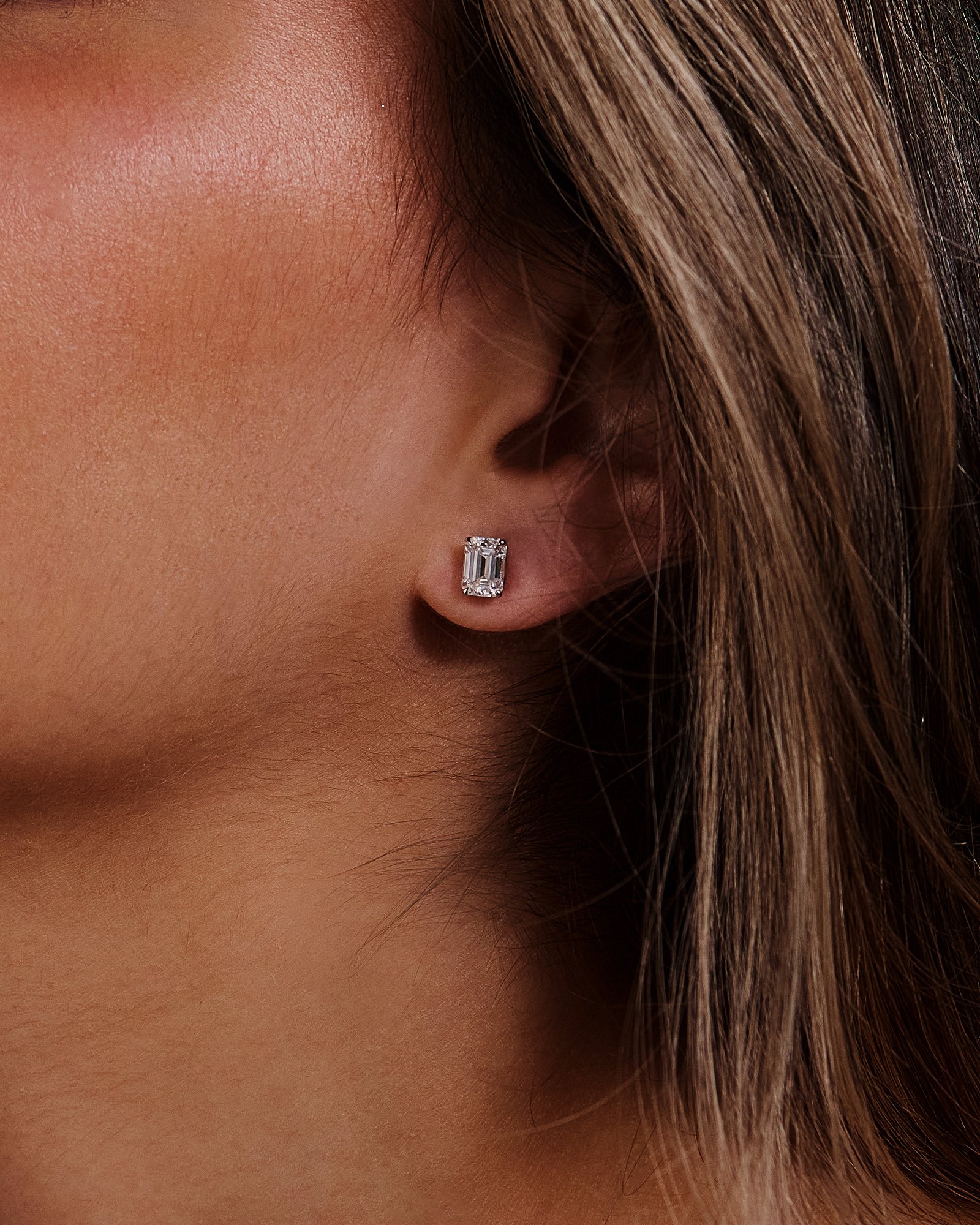 Barbara - Emerald 4 Claw Earrings Lifestyle Image