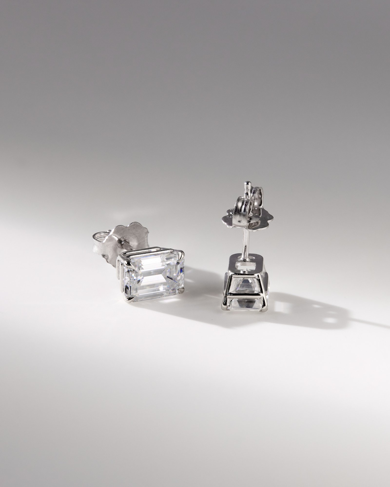 Barbara - Emerald 4 Claw Earrings Lifestyle Image