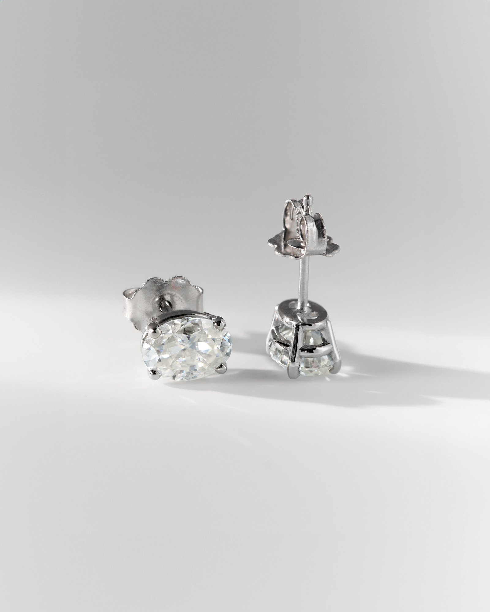 Faye - Oval 4 Claw Earrings Lifestyle Image