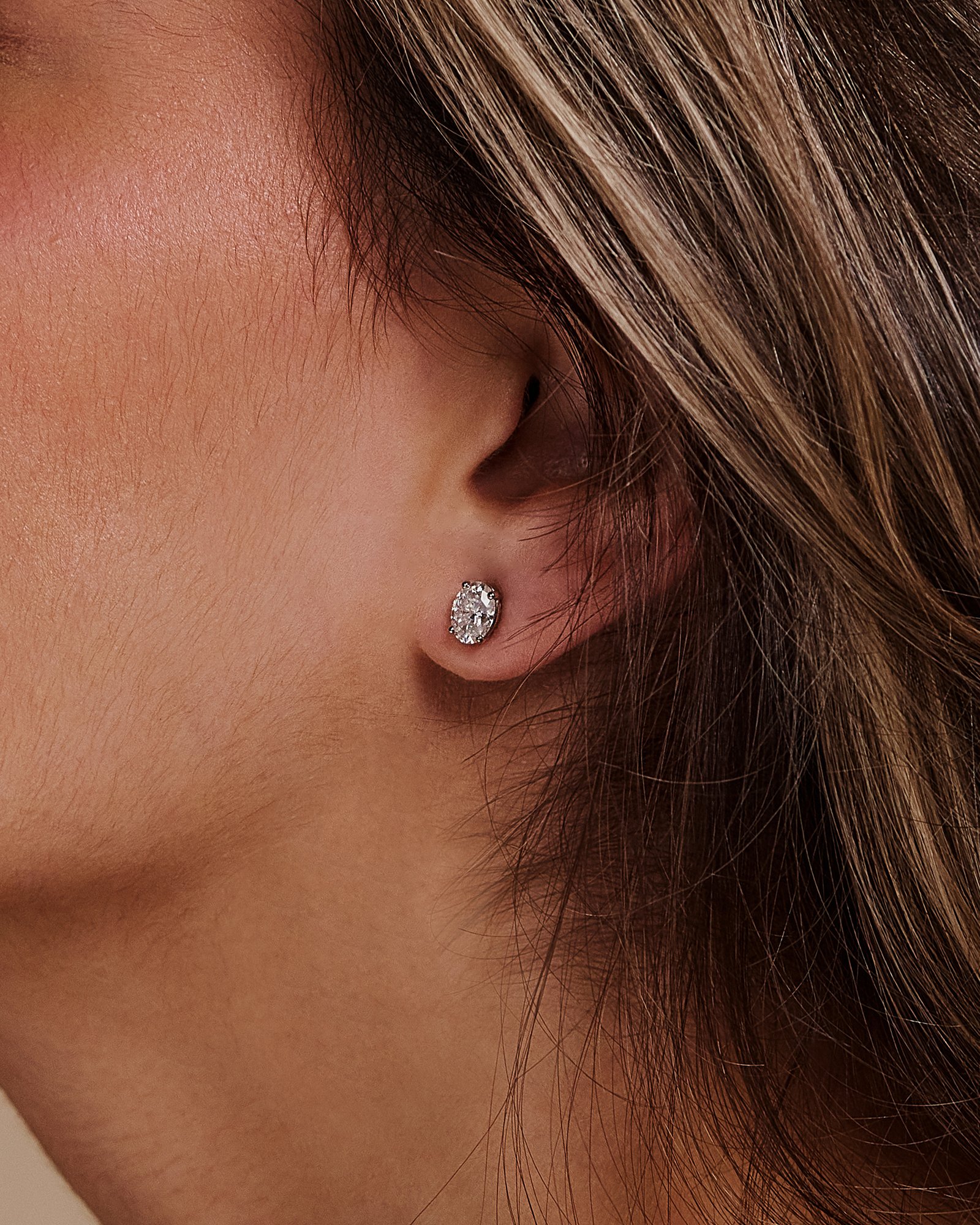 Faye - Oval 4 Claw Earrings Lifestyle Image