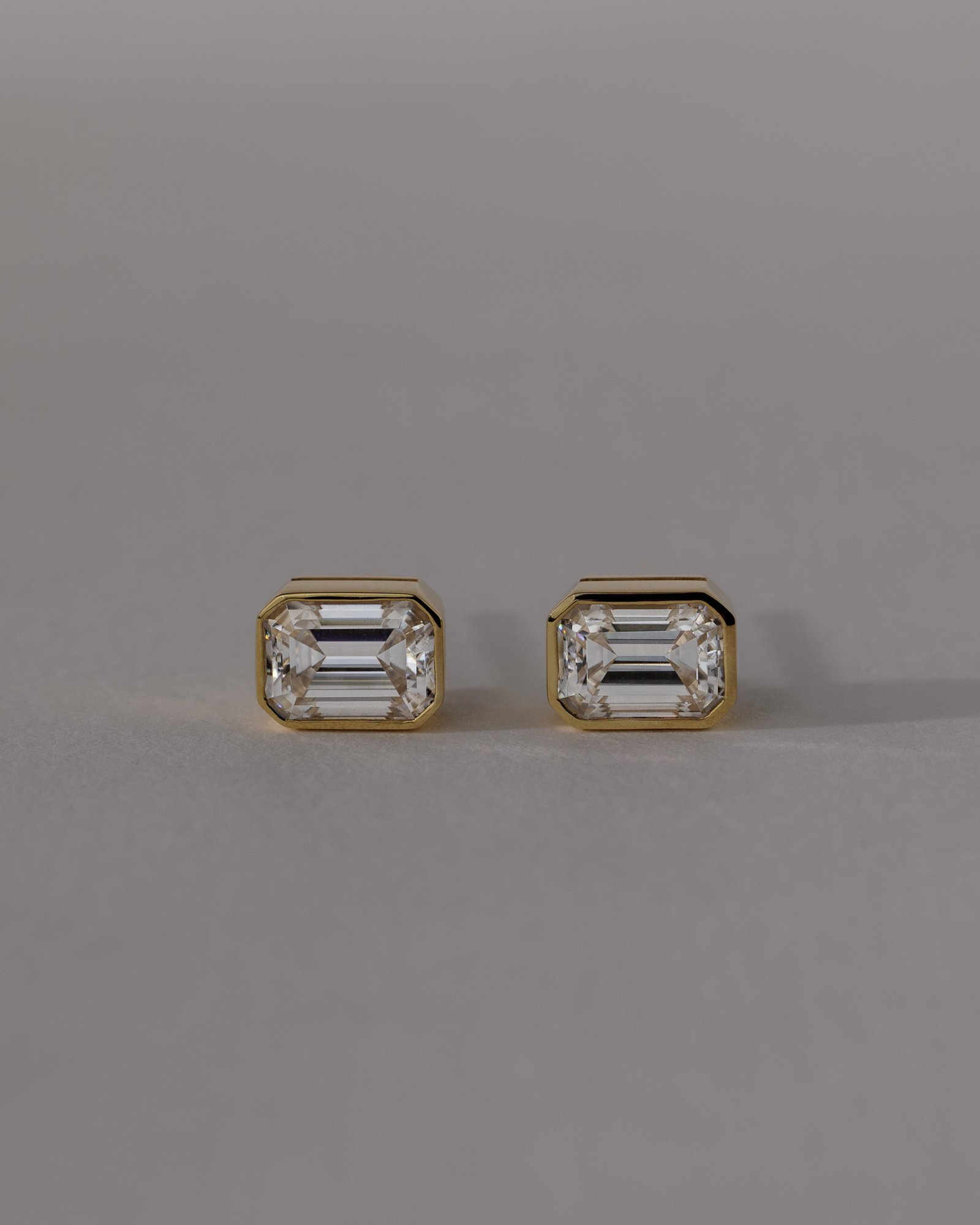 Kara - Emerald Bezel Earrings Lifestyle Image