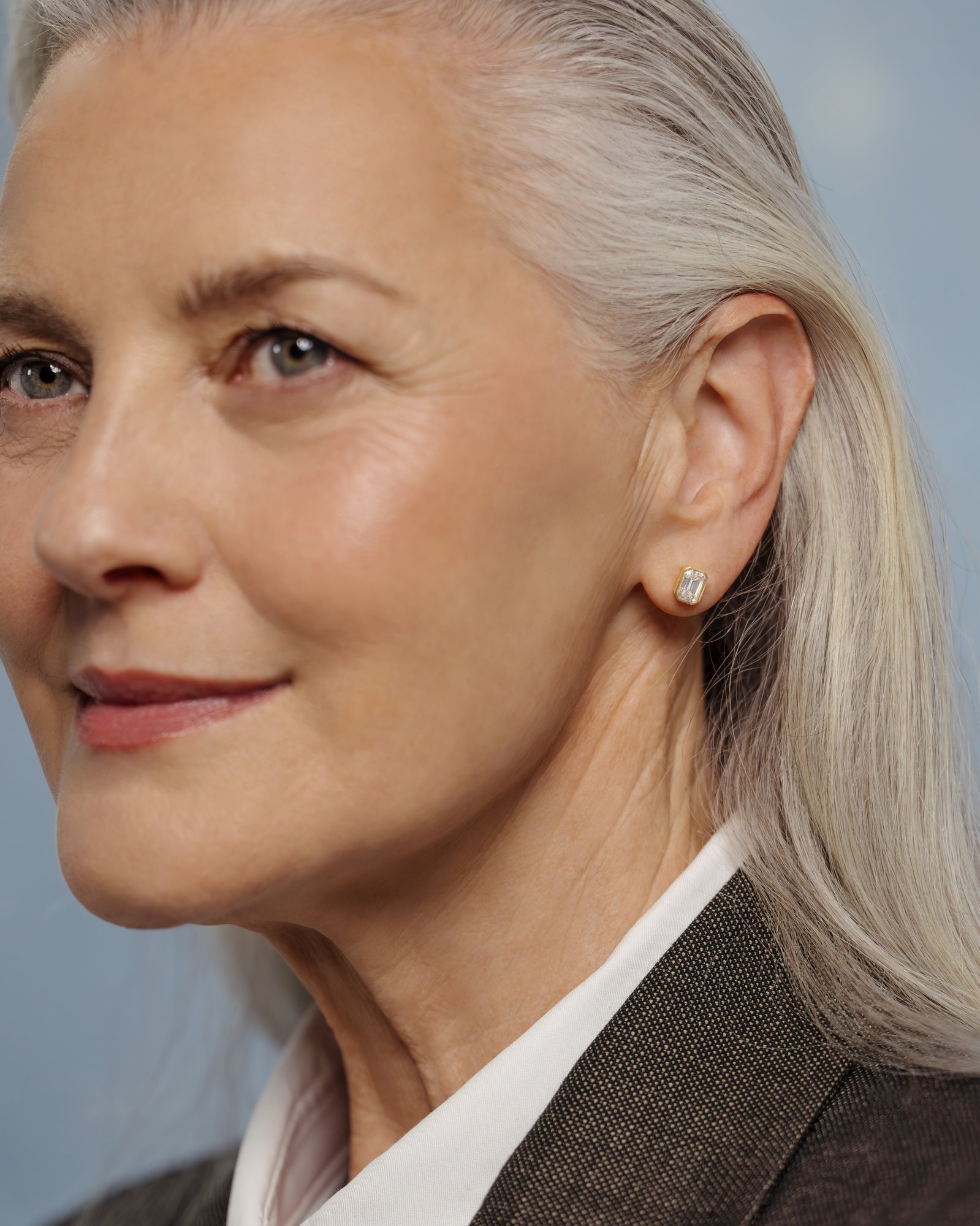 Kara - Emerald Bezel Earrings Lifestyle Image