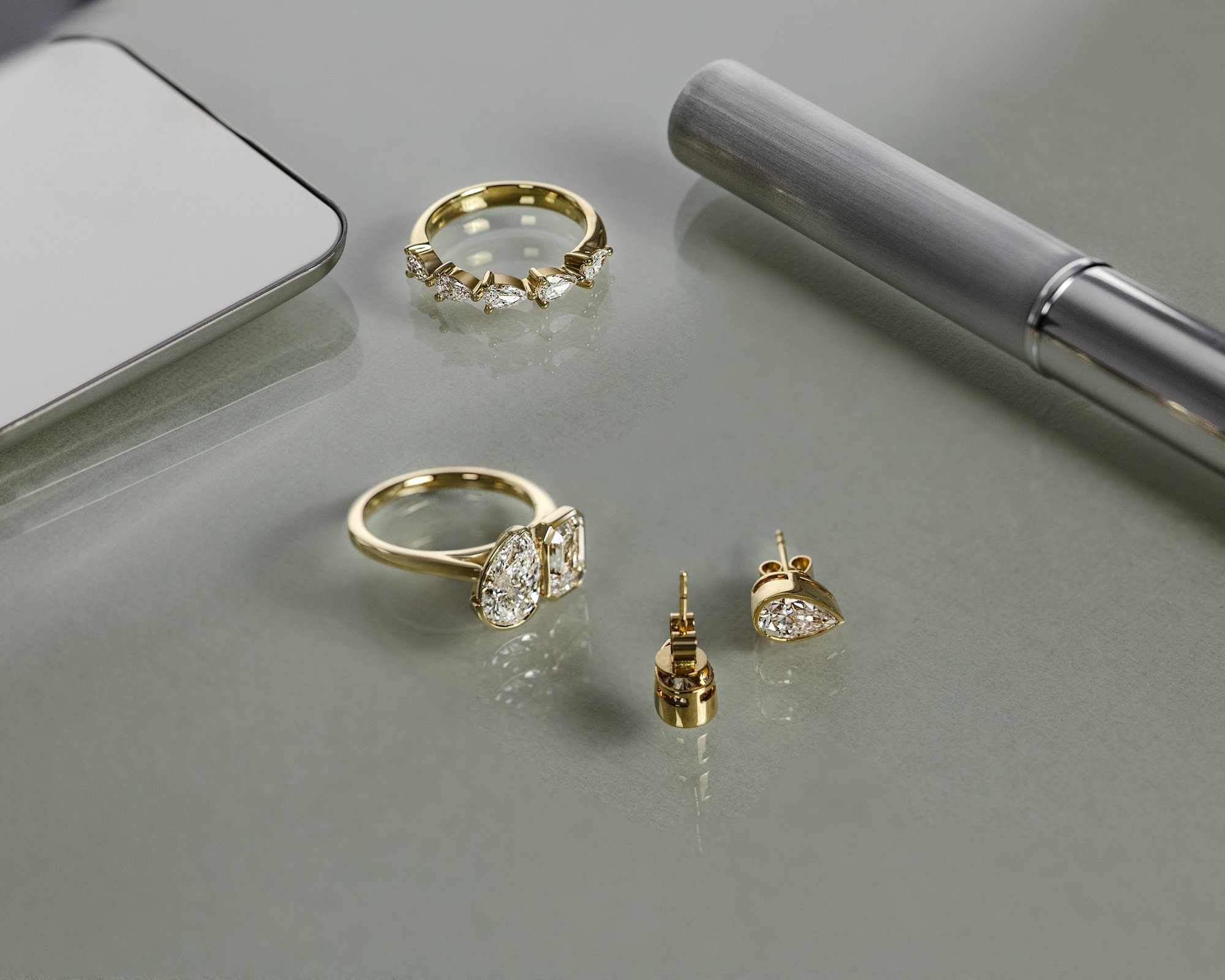 Lucia - Pear Bezel Earrings Lifestyle Image