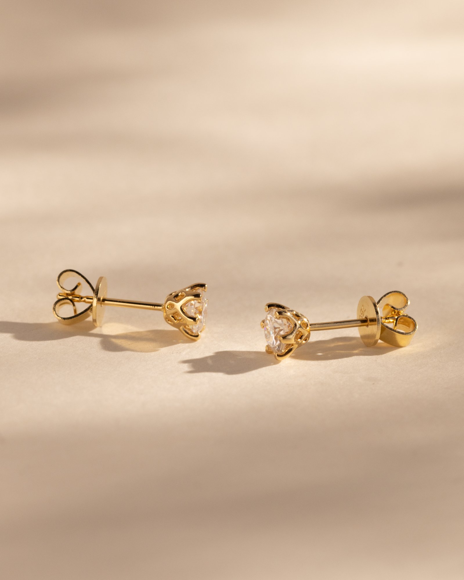 Oriana - Round 6 Claw Earrings Lifestyle Image