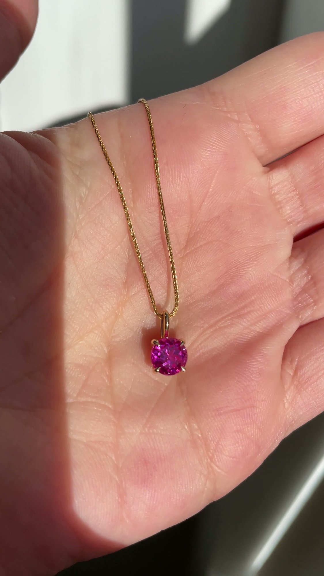 Alicia  Round Pink Sapphire Pendant Lifestyle Image