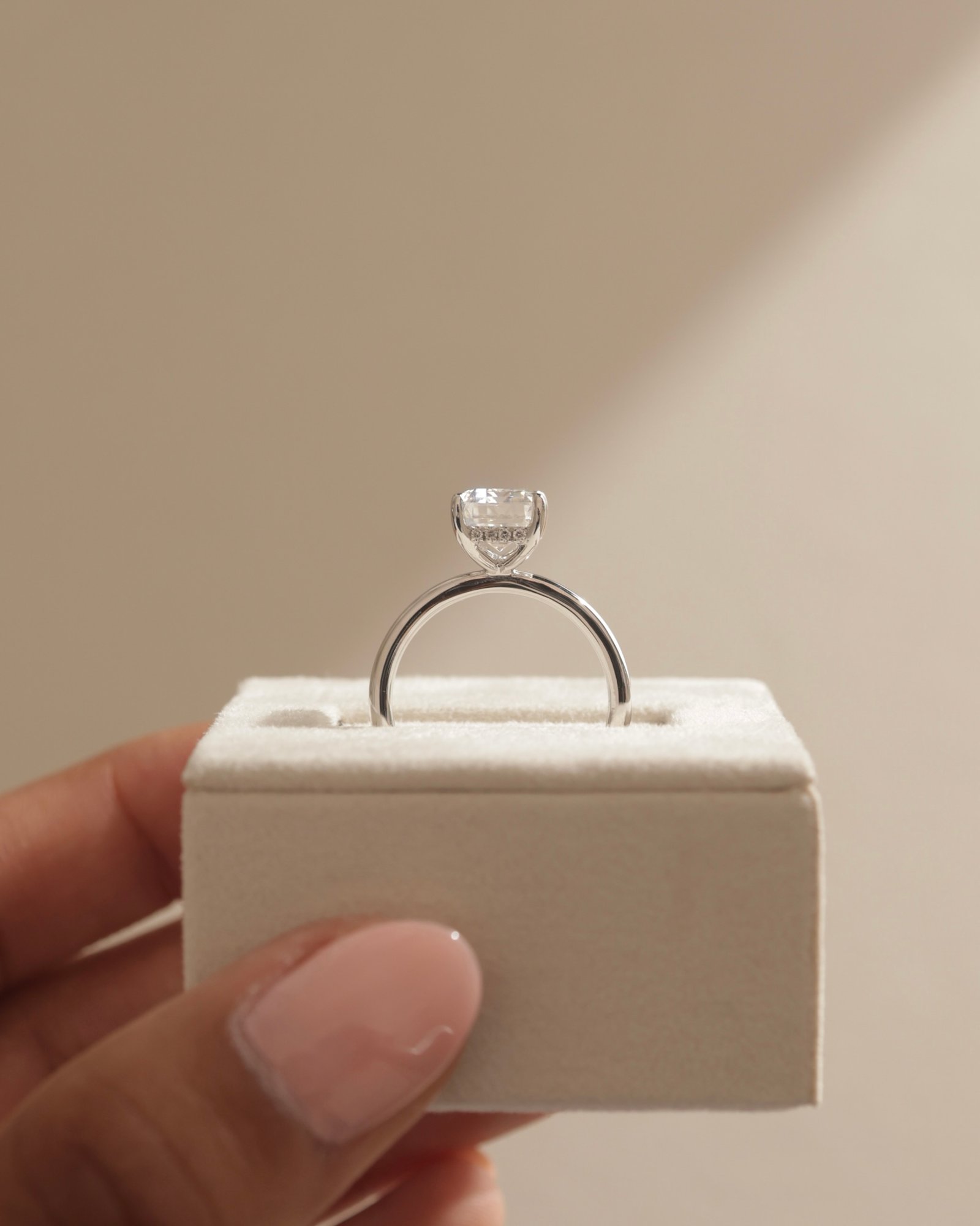 Platinum | 9x7mm Emerald Moissanite | Lab Diamond side stones