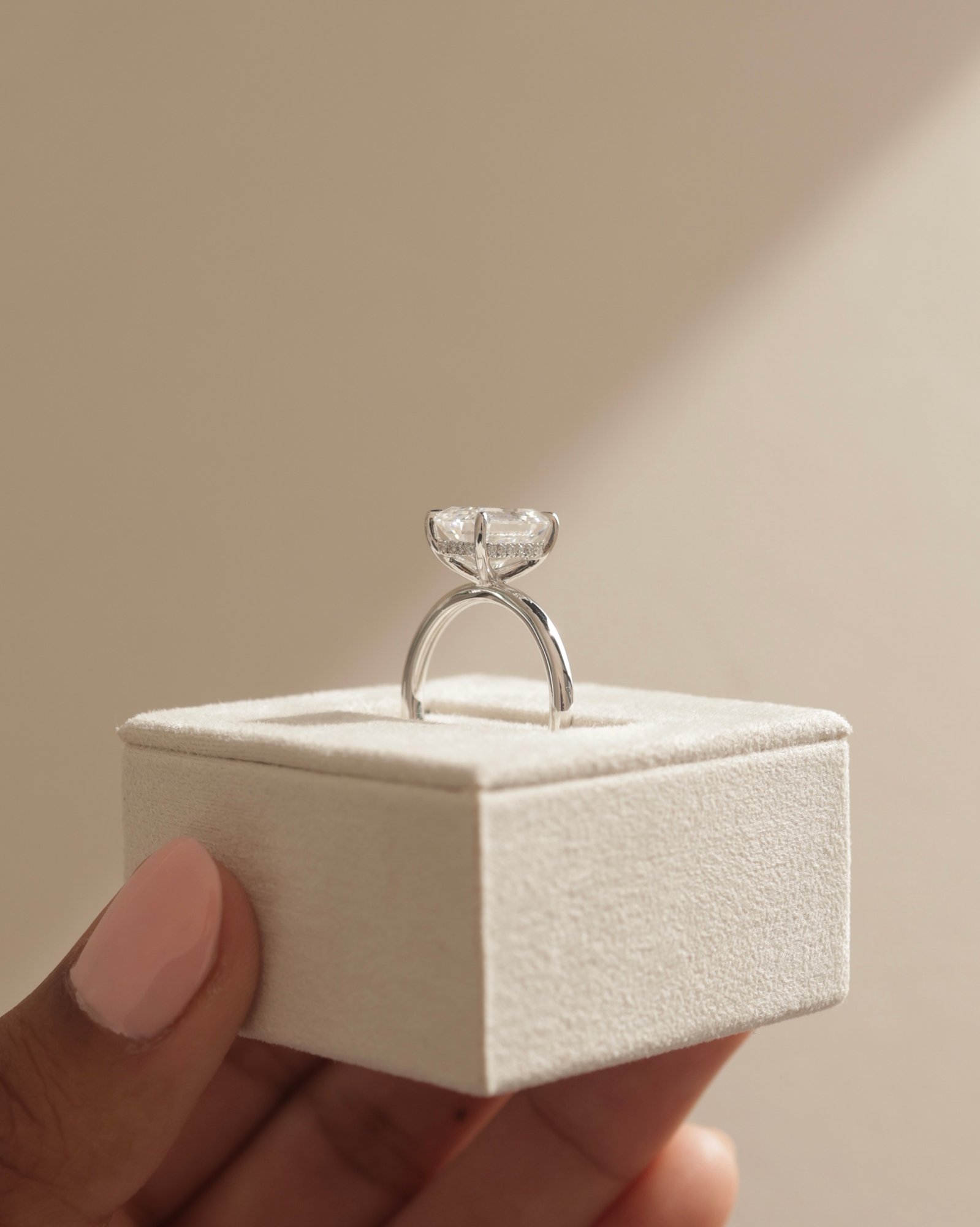 Platinum | 9x7mm Emerald Moissanite | Lab Diamond side stones