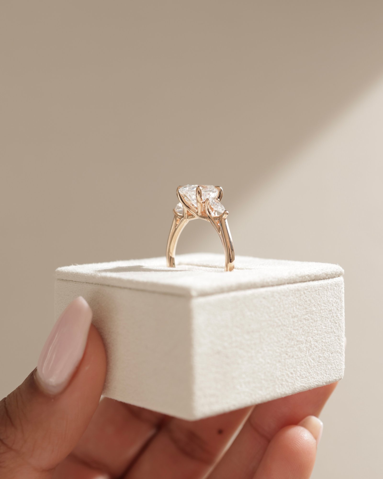 18k Rose Gold | 10x7mm Oval Moissanite | Lab Diamond side stones