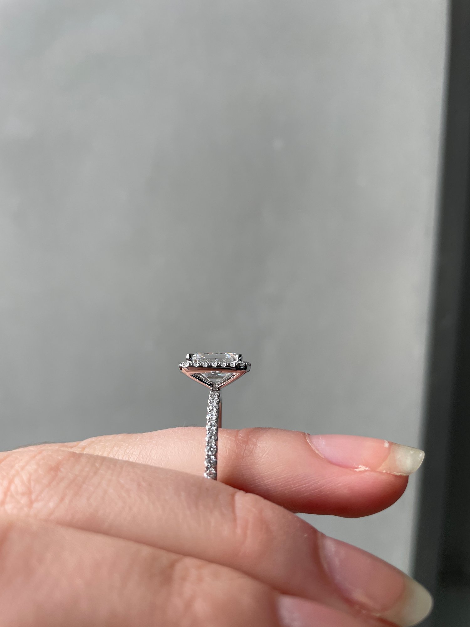 Platinum | 8.5x6.5mm Emerald Moissanite | Lab Diamond side stones