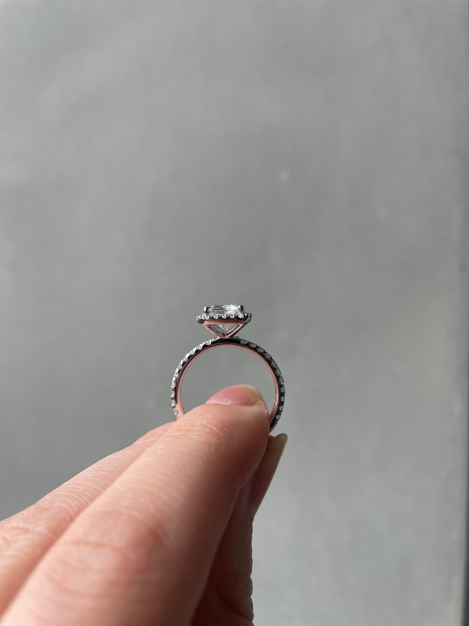 Platinum | 8.5x6.5mm Emerald Moissanite | Lab Diamond side stones