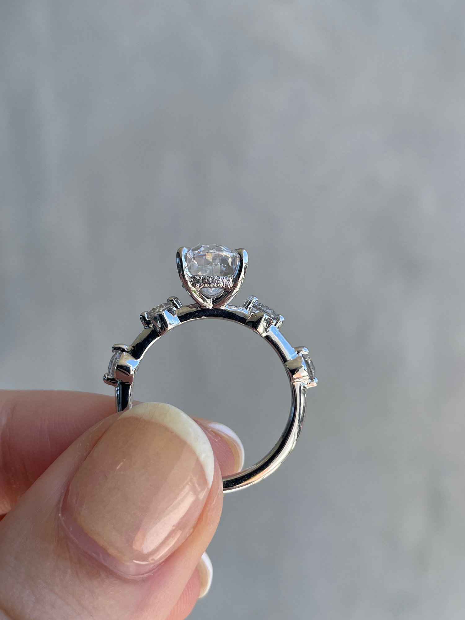 Platinum | 10x7mm Oval Moissanite | Lab Diamond side stones