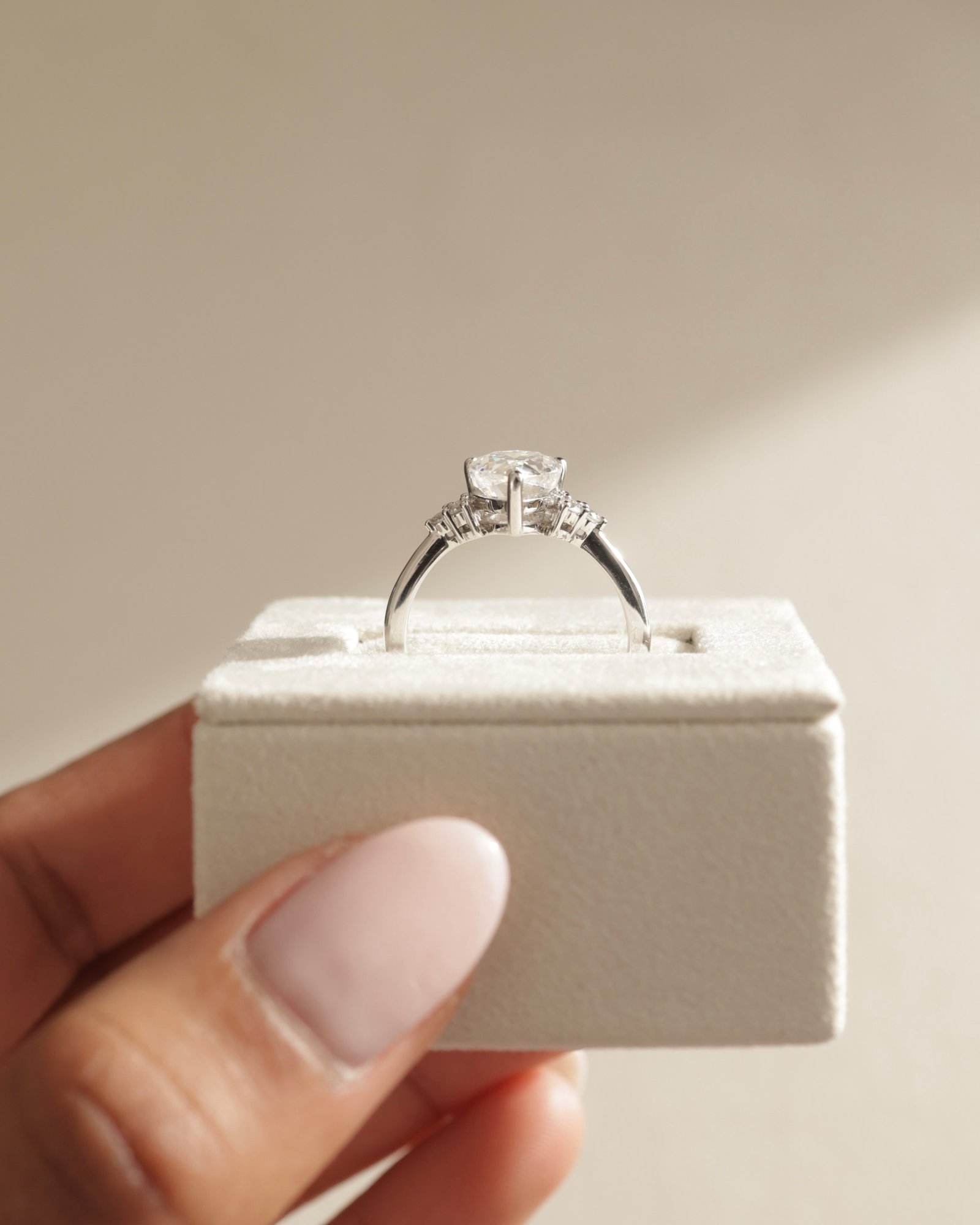 Platinum | 10x7mm Pear Moissanite | Lab Diamond side stones