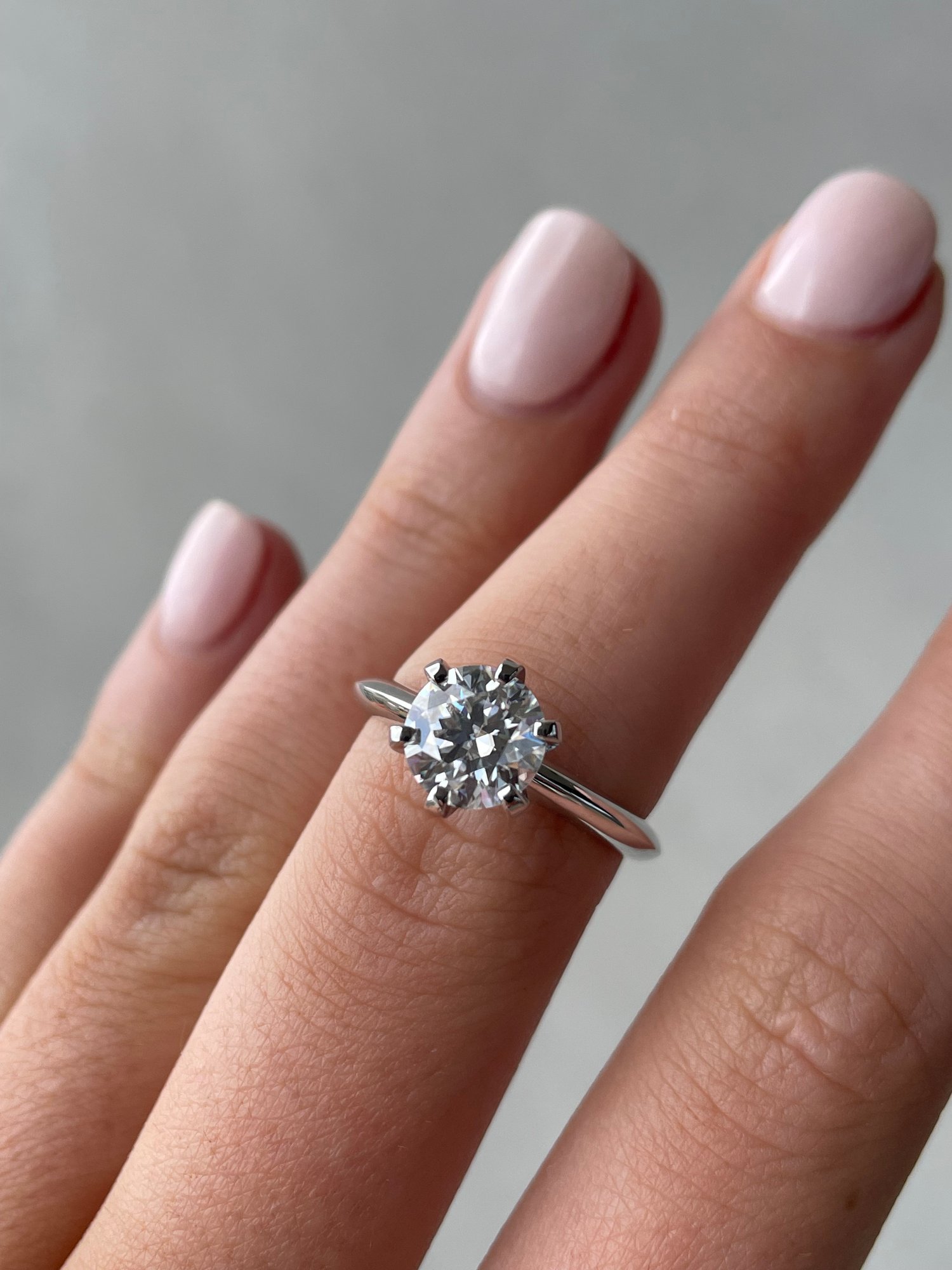 Platinum | 7.5mm Round Moissanite
