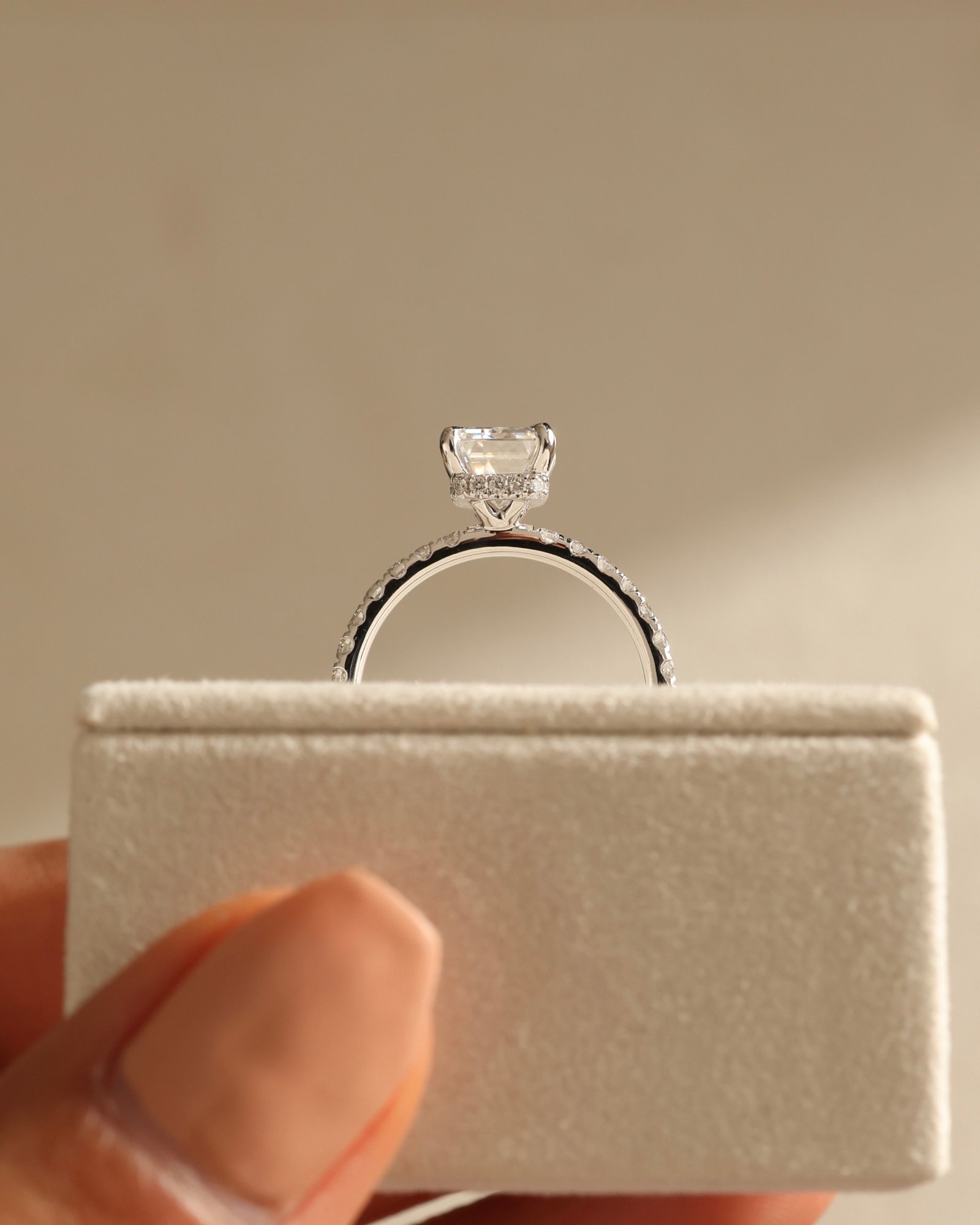 Platinum | 8.5x6.5mm Emerald Moissanite | Lab Diamond side stones