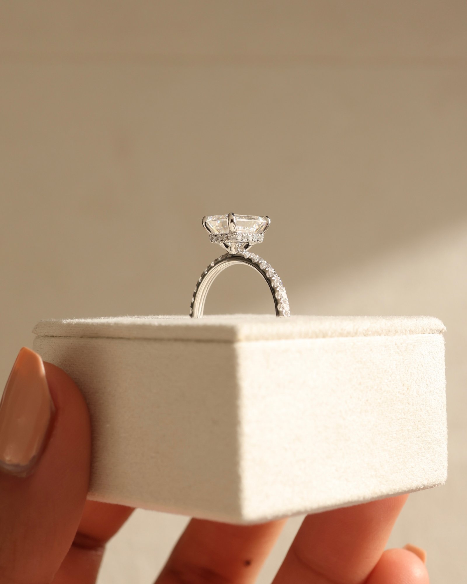 Platinum | 8.5x6.5mm Emerald Moissanite | Lab Diamond side stones