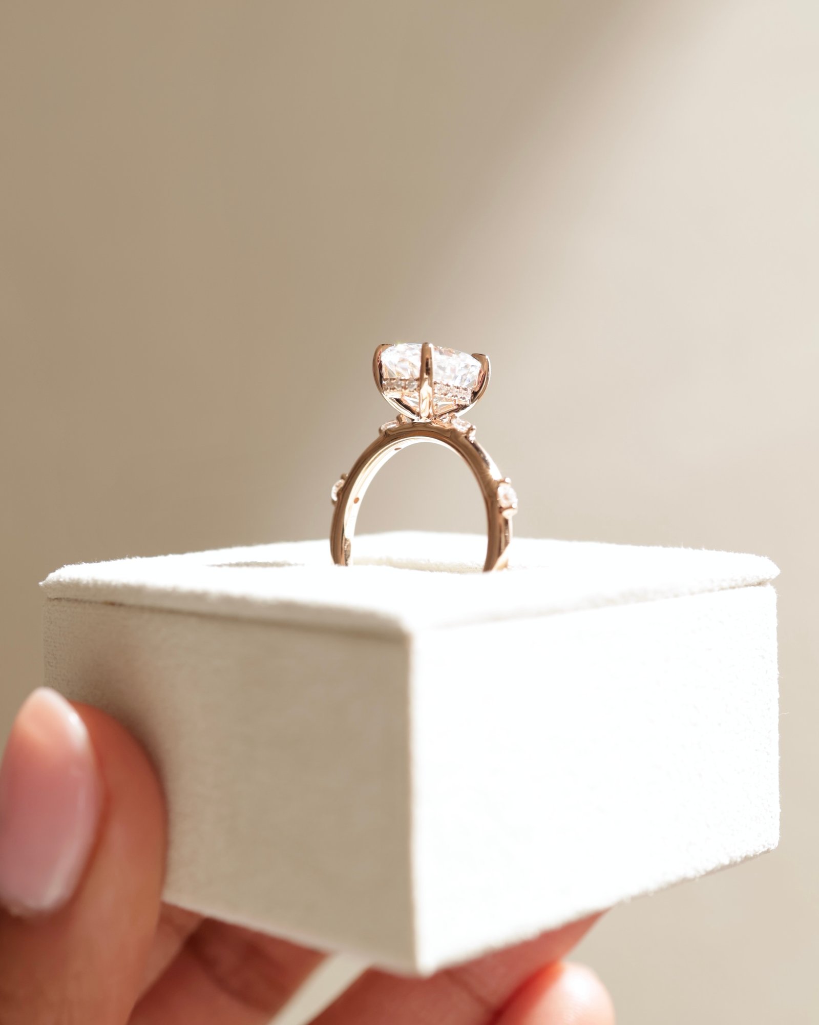 18k Rose Gold | 10x7mm Oval Moissanite | Lab Diamond side stones