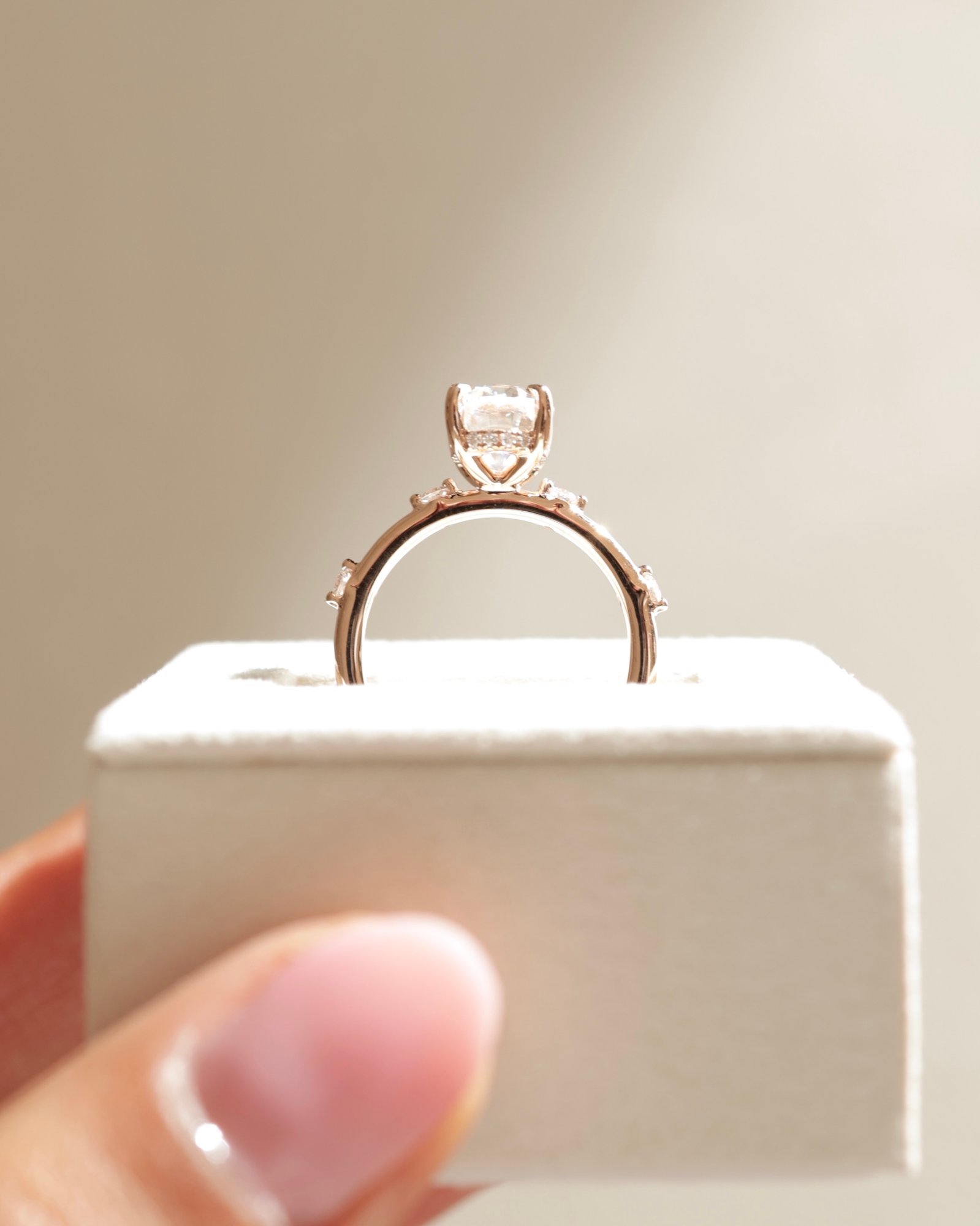 18k Rose Gold | 10x7mm Oval Moissanite | Lab Diamond side stones