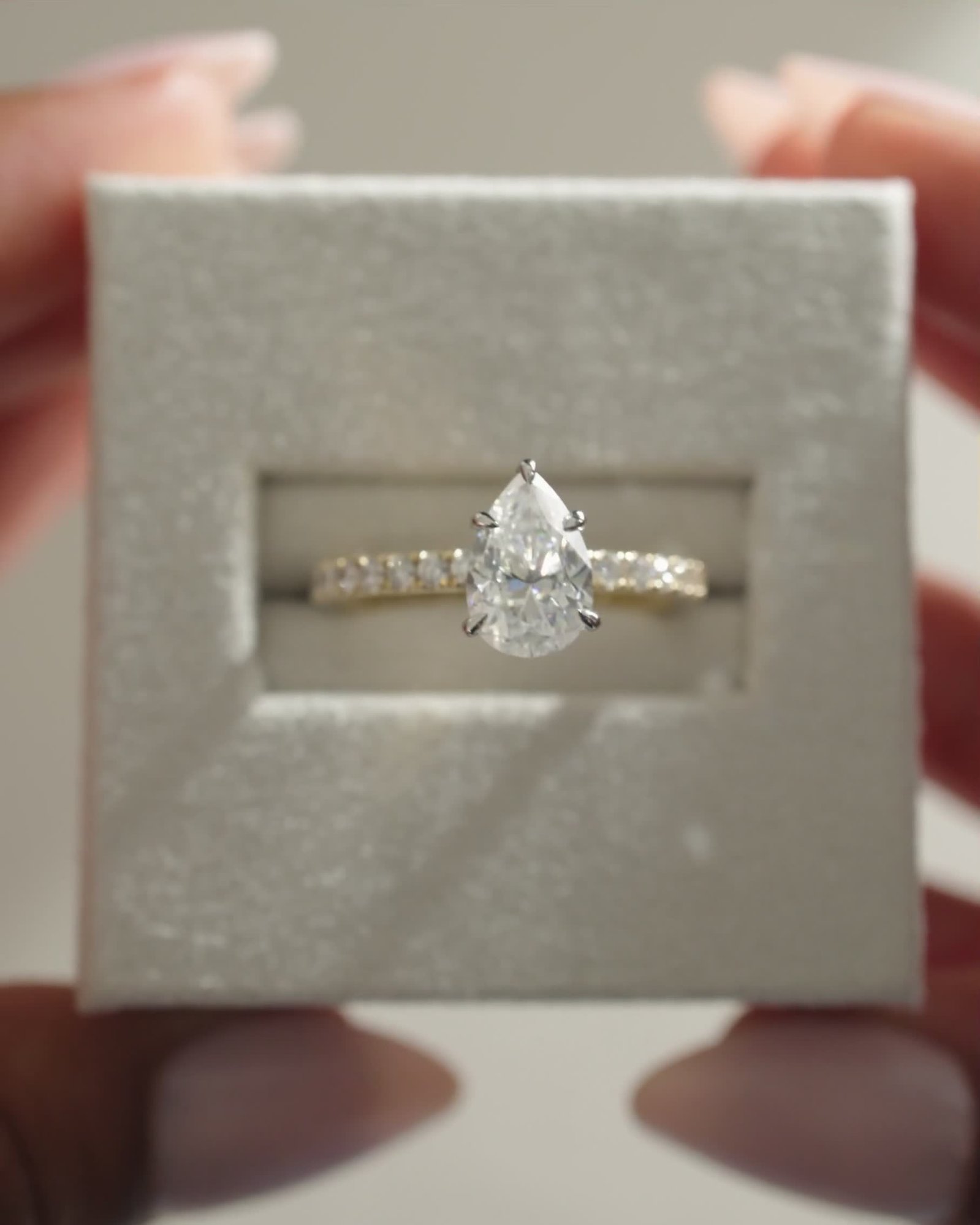 18k Yellow Gold / Platinum | 9x6mm Pear Moissanite | Lab Diamond side stones