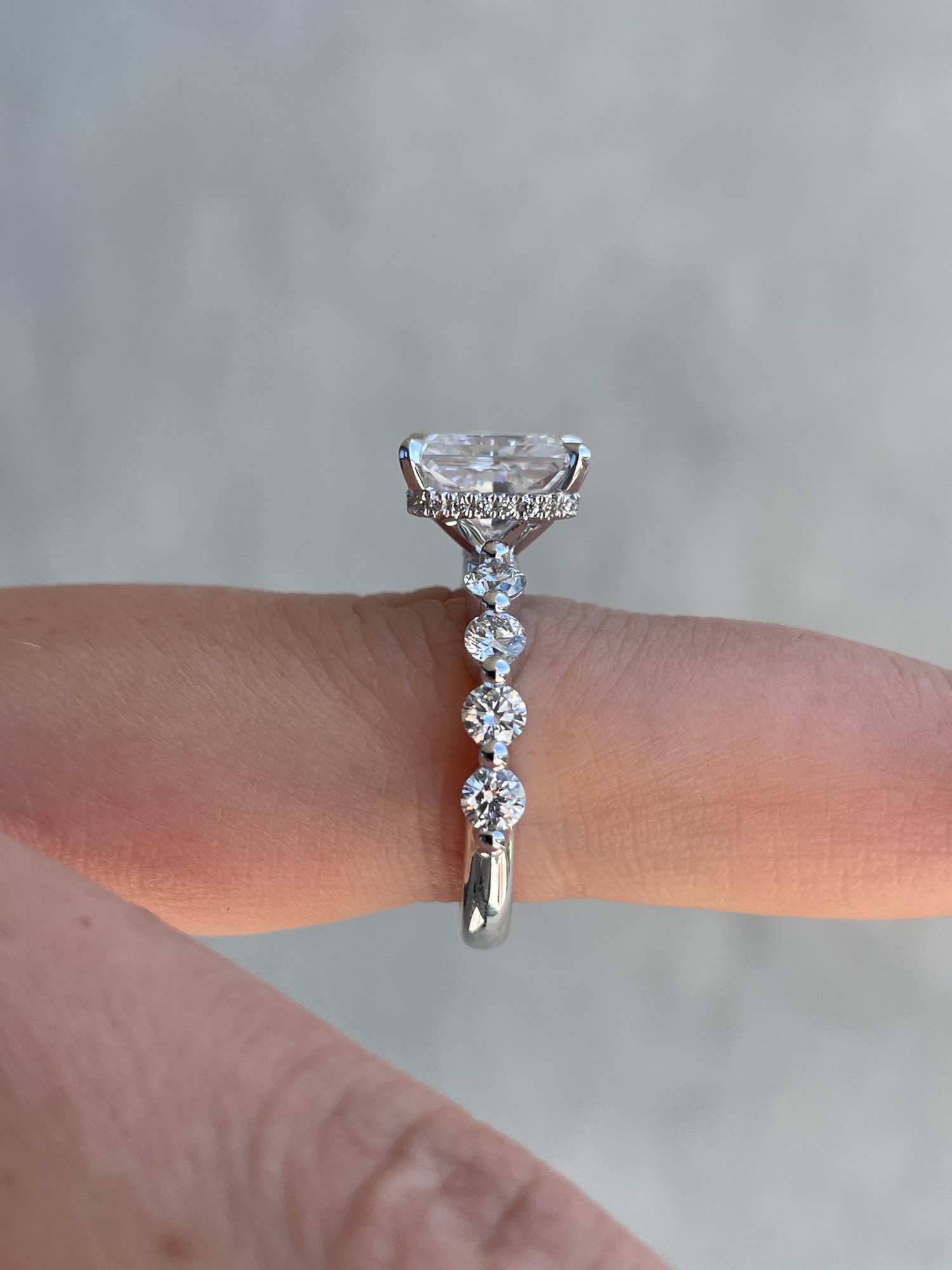 Platinum | 9x7mm Radiant Moissanite | Lab Diamond side stones