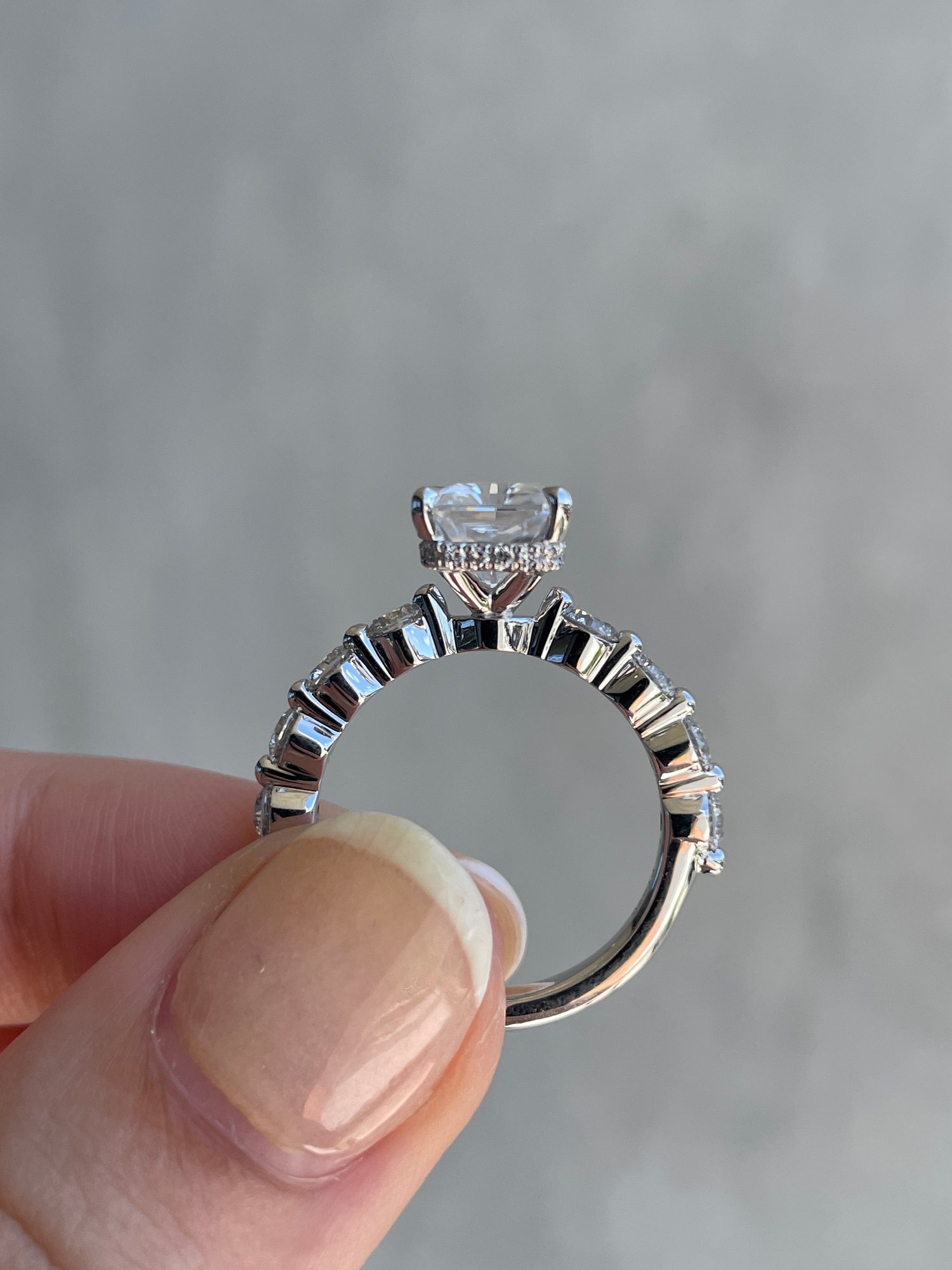 Platinum | 9x7mm Radiant Moissanite | Lab Diamond side stones