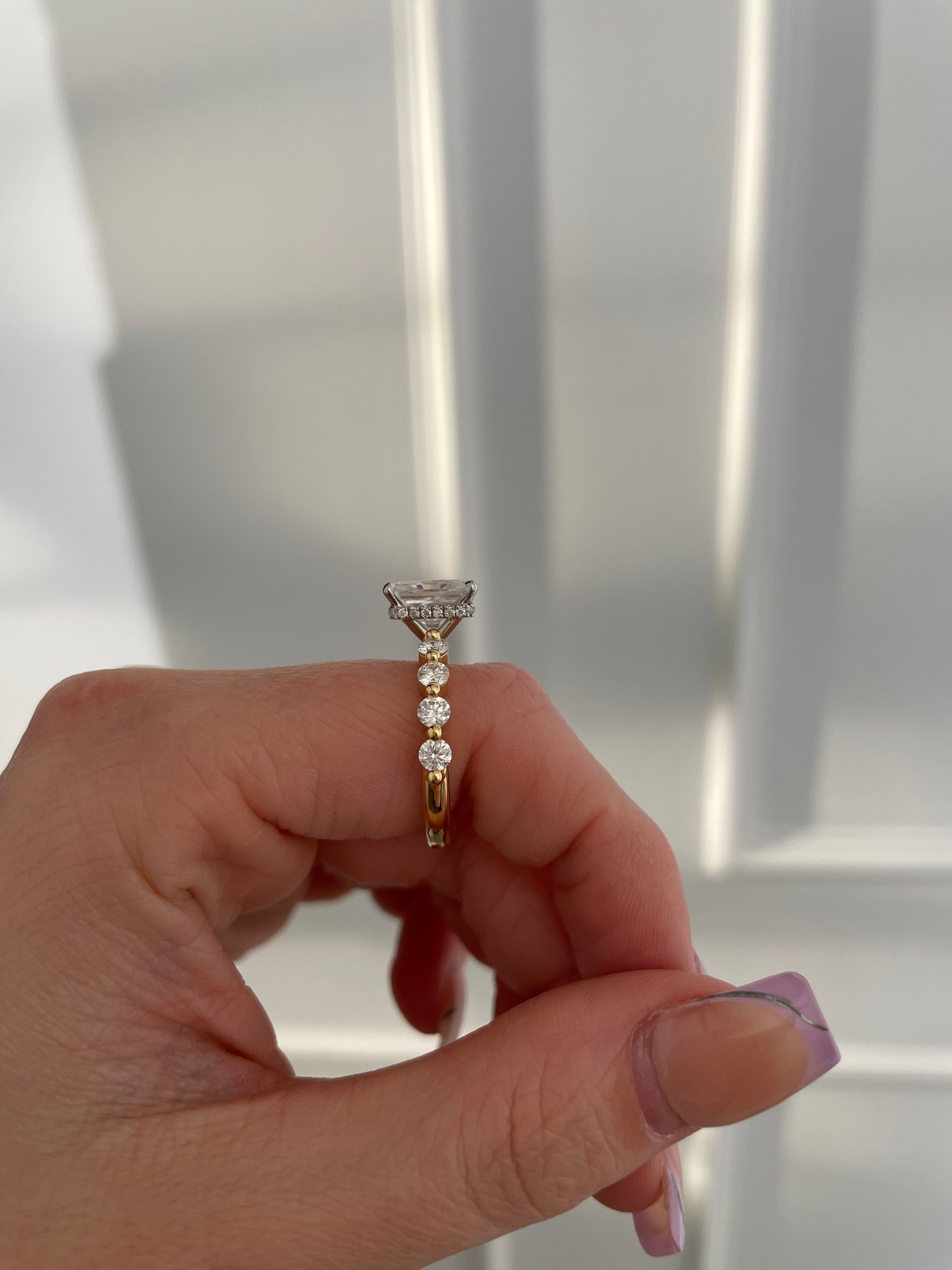 18k Yellow Gold / Platinum | 9x7mm Radiant Moissanite | Moissanite side stones