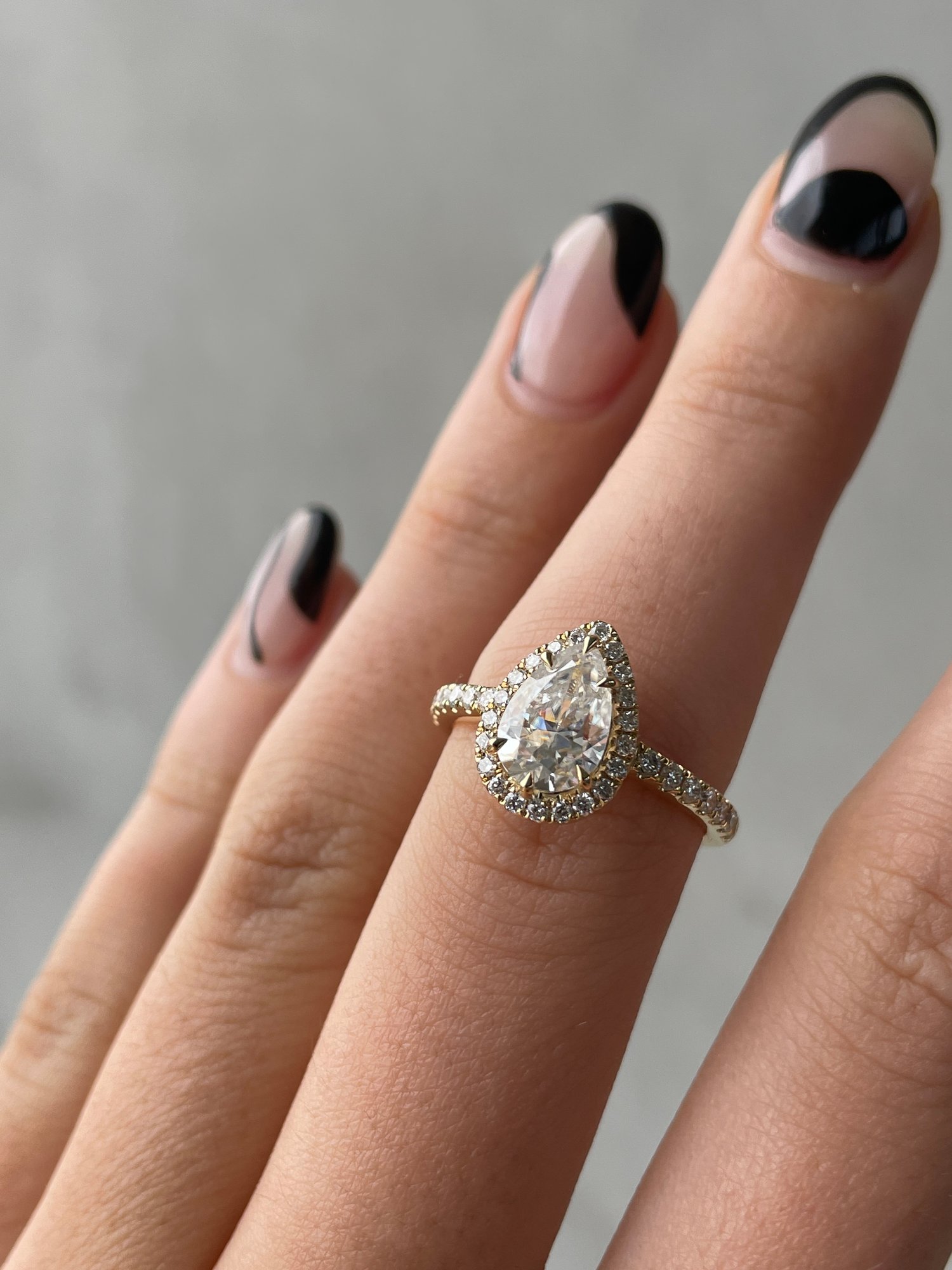 18k Yellow Gold | 9x6mm Pear Moissanite | Lab Diamond side stones