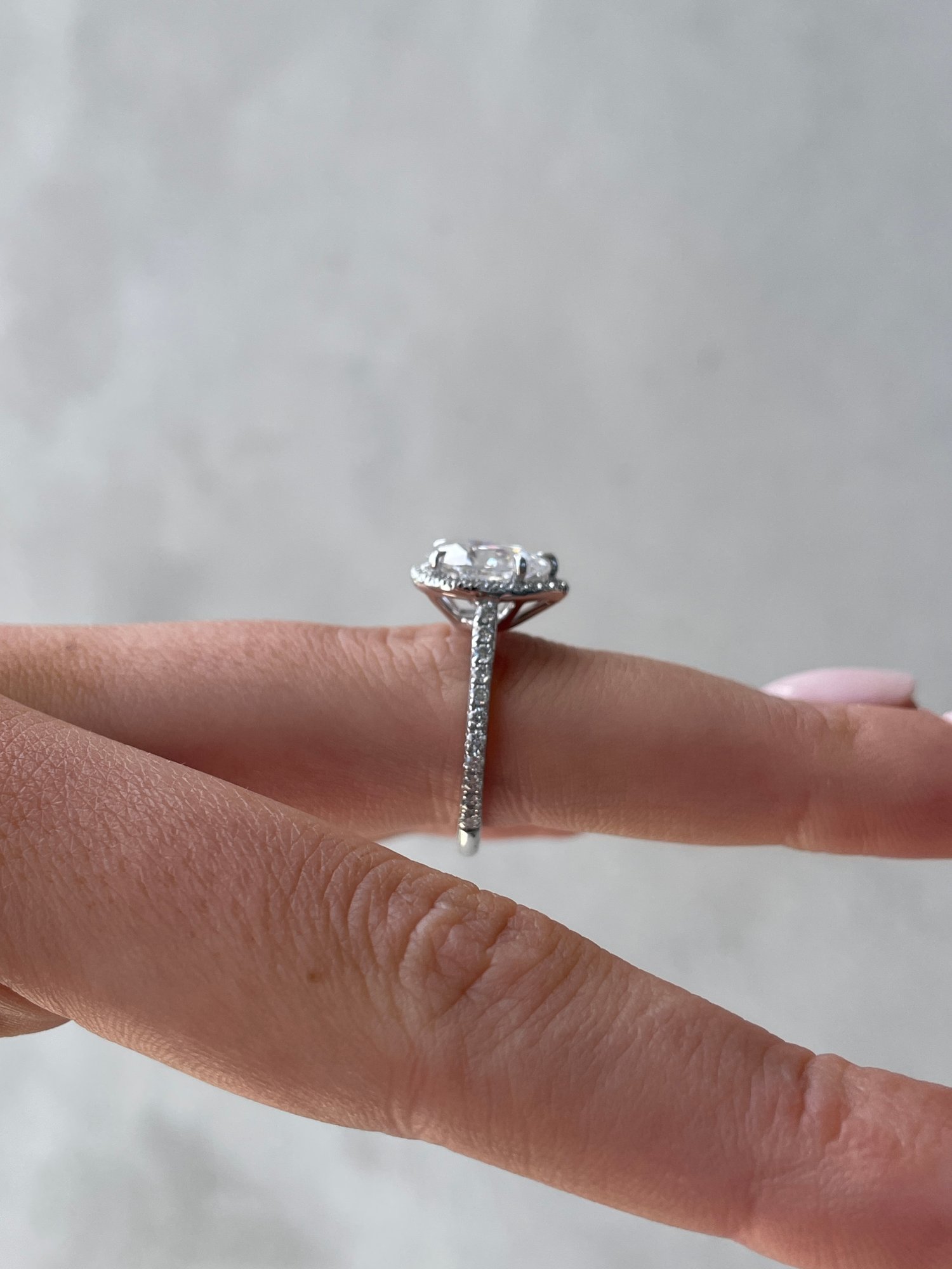 Platinum | 10x7mm Pear Moissanite | Lab Diamond side stones