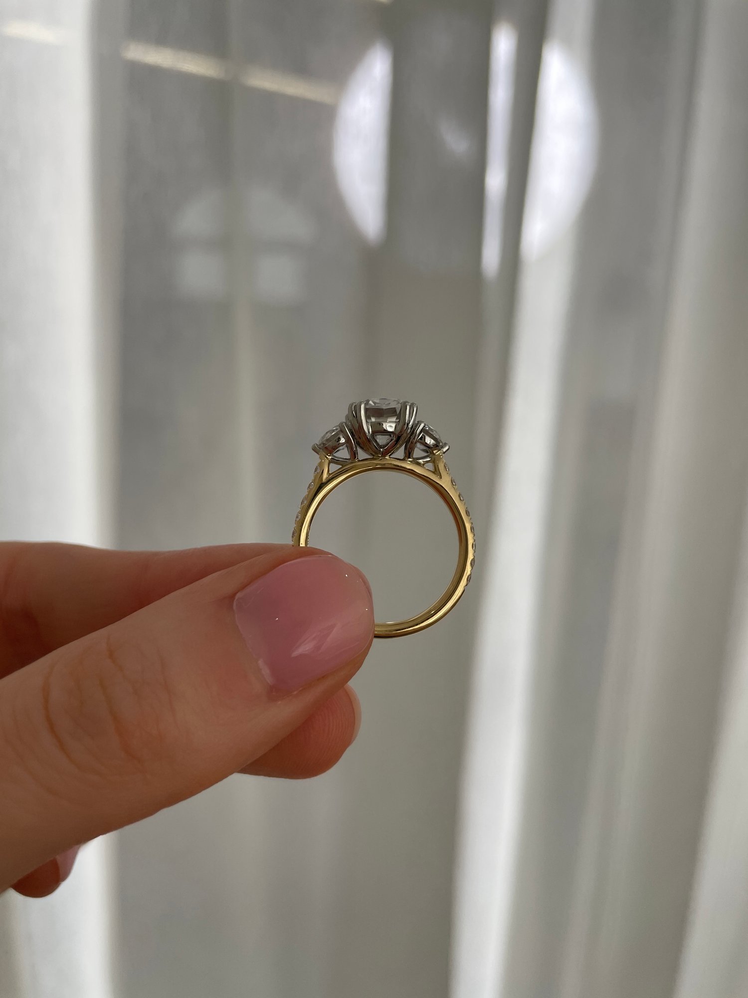 18k Yellow Gold / Platinum | High Set | 9x7mm Elongated Cushion Moissanite | Moissanite side stones