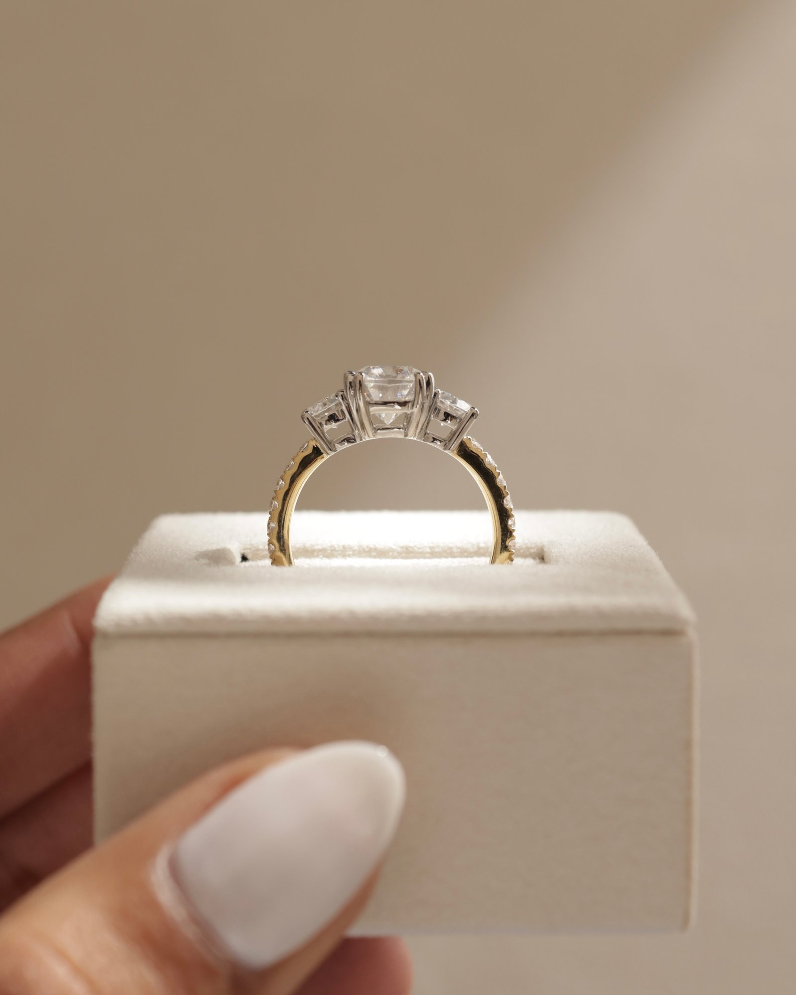 18k Yellow Gold / Platinum | Low Set | 9x7mm Elongated Cushion Moissanite | Moissanite side stones