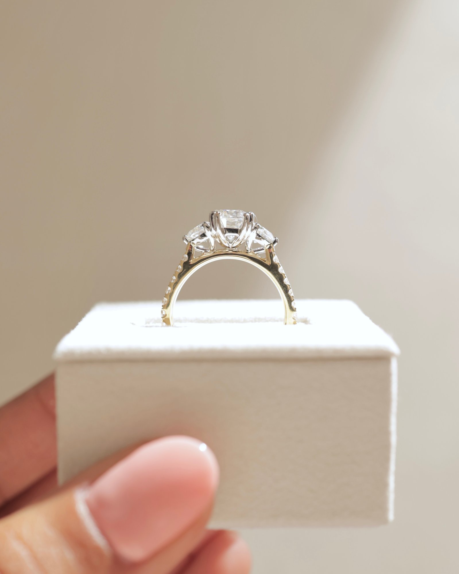 18k Yellow Gold / Platinum | High Set | 8x6mm Elongated Cushion Moissanite | Moissanite side stones