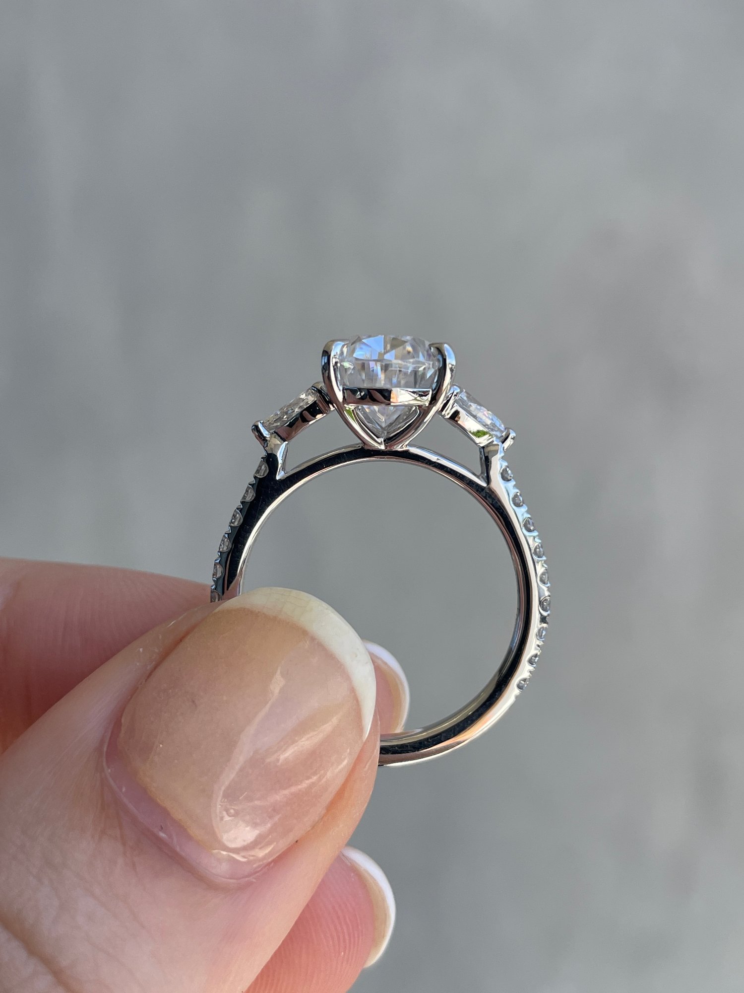 Platinum | 10x7mm Pear Moissanite | Lab Diamond side stones