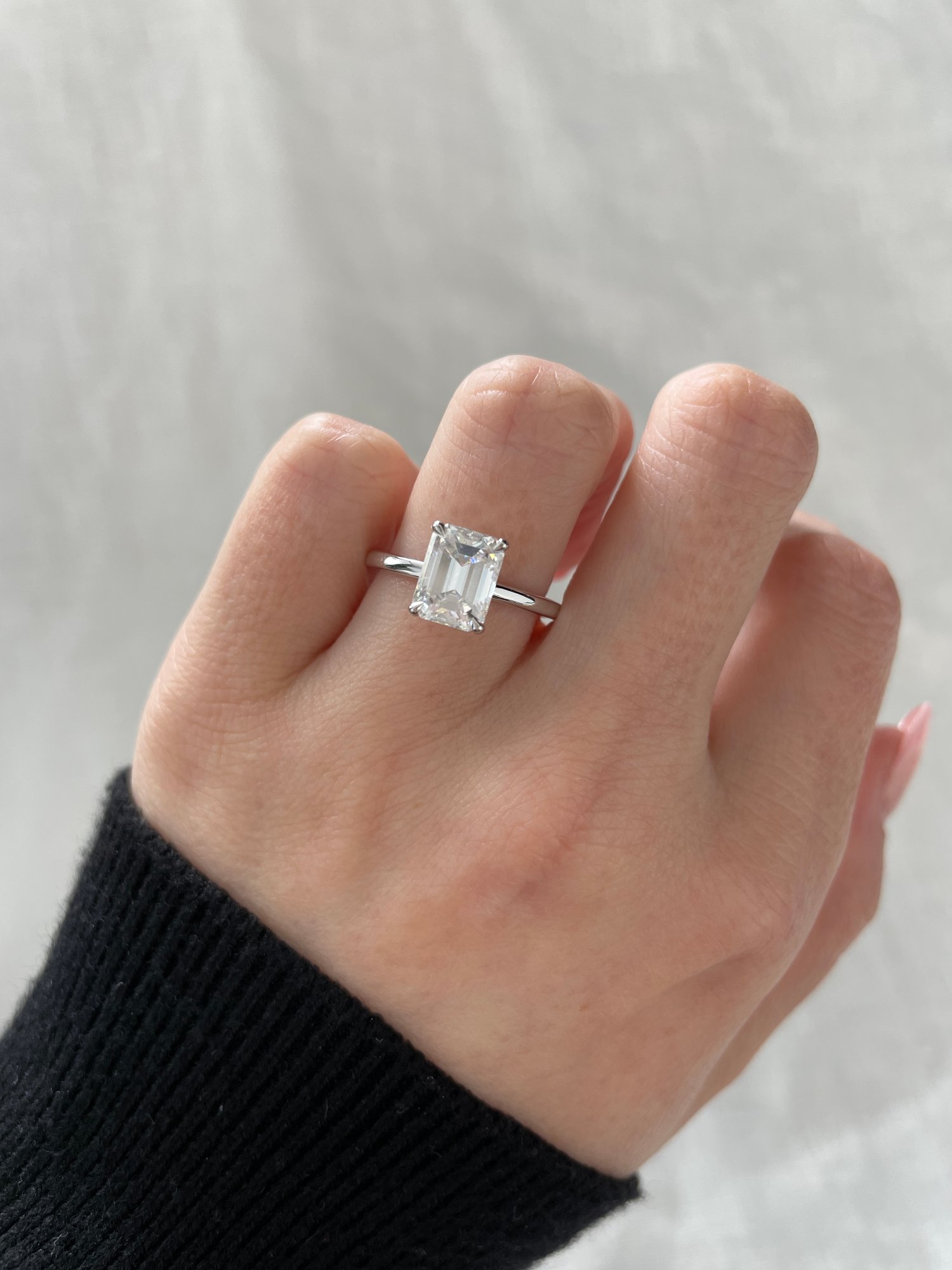 Platinum | 8.5x6.5mm Emerald Moissanite | Lab Diamond side stones