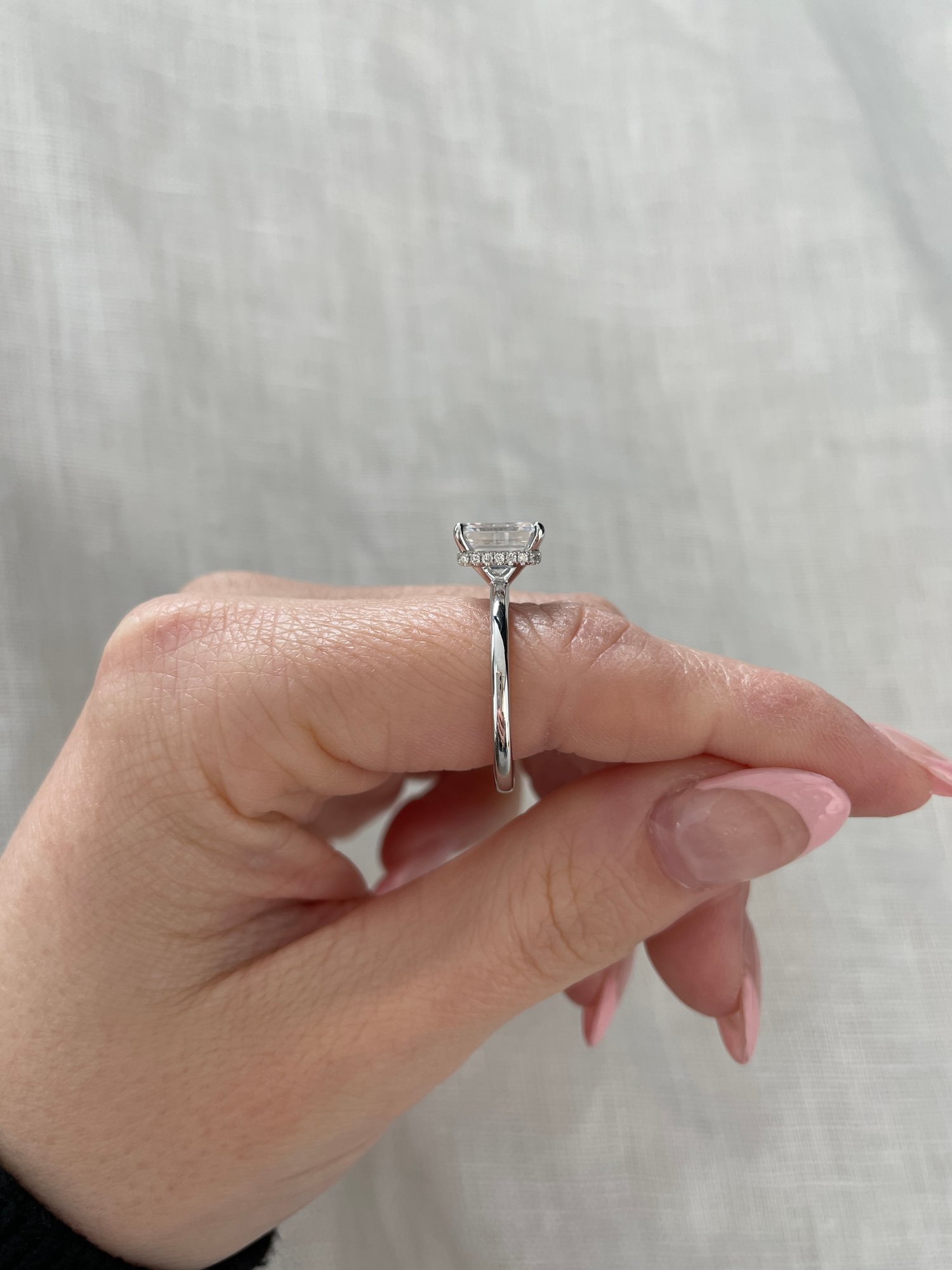 Platinum | 8.5x6.5mm Emerald Moissanite | Lab Diamond side stones