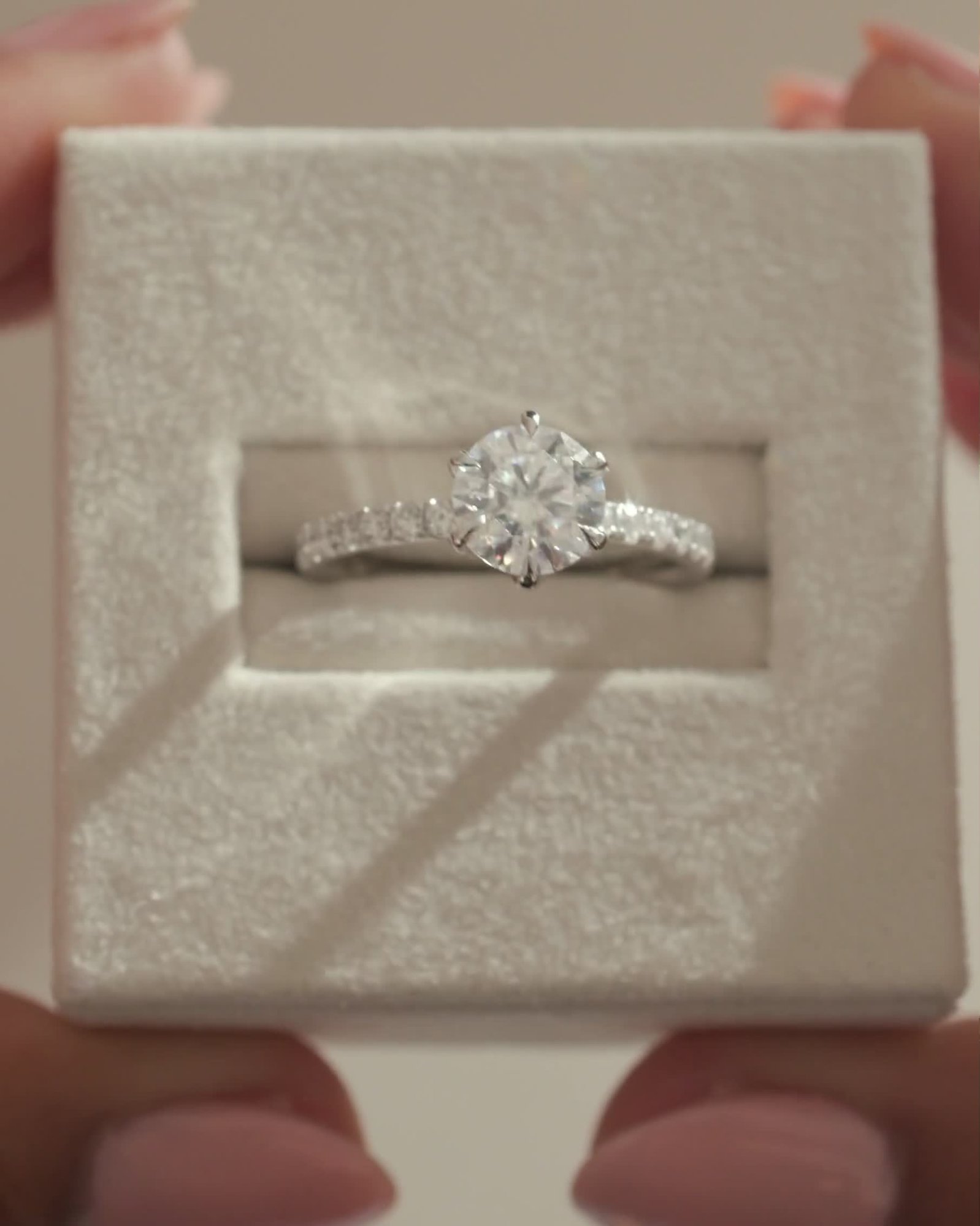 Platinum | 7mm Round Moissanite | Lab Diamond side stones