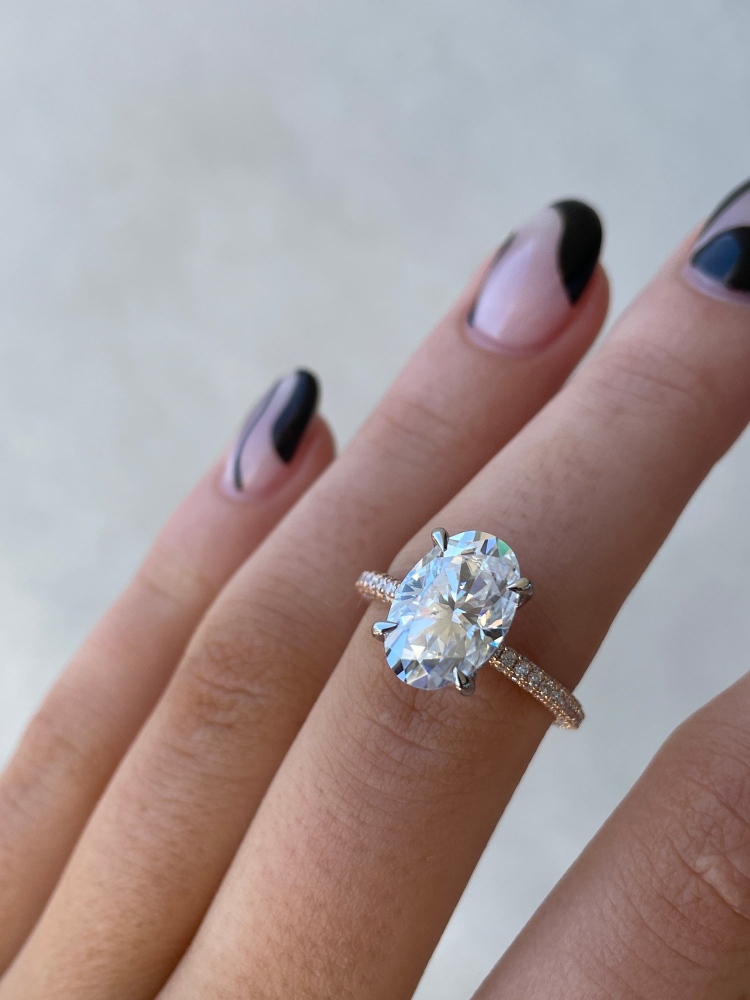 18k Rose Gold / Platinum | 12x8mm Oval Moissanite | Lab Diamond side stones