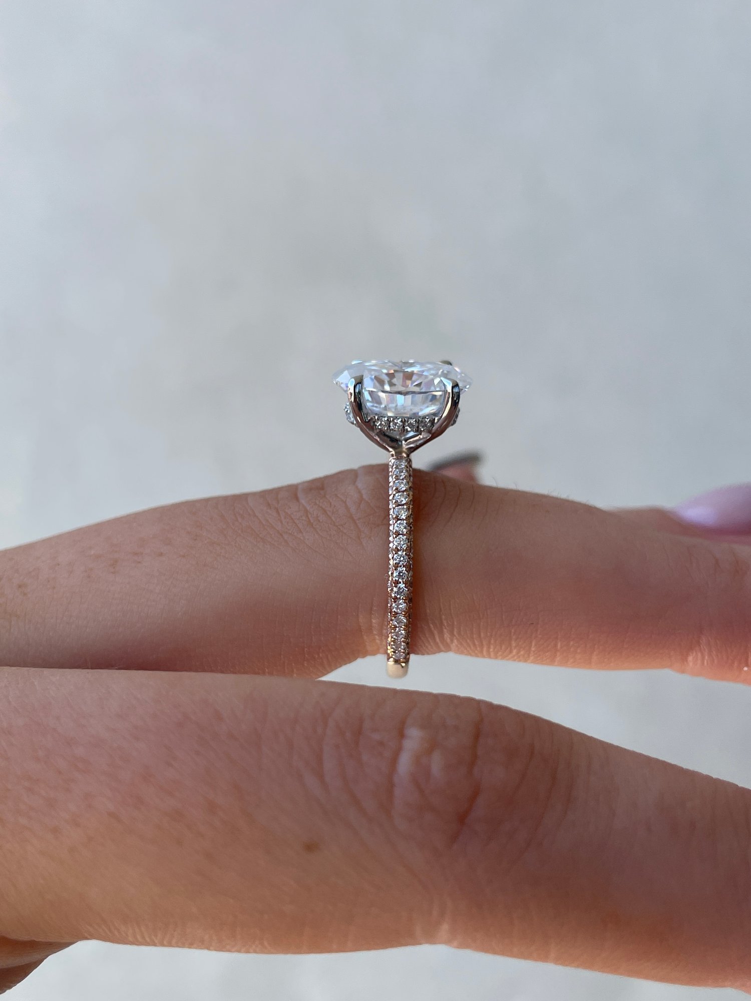 18k Rose Gold / Platinum | 12x8mm Oval Moissanite | Lab Diamond side stones