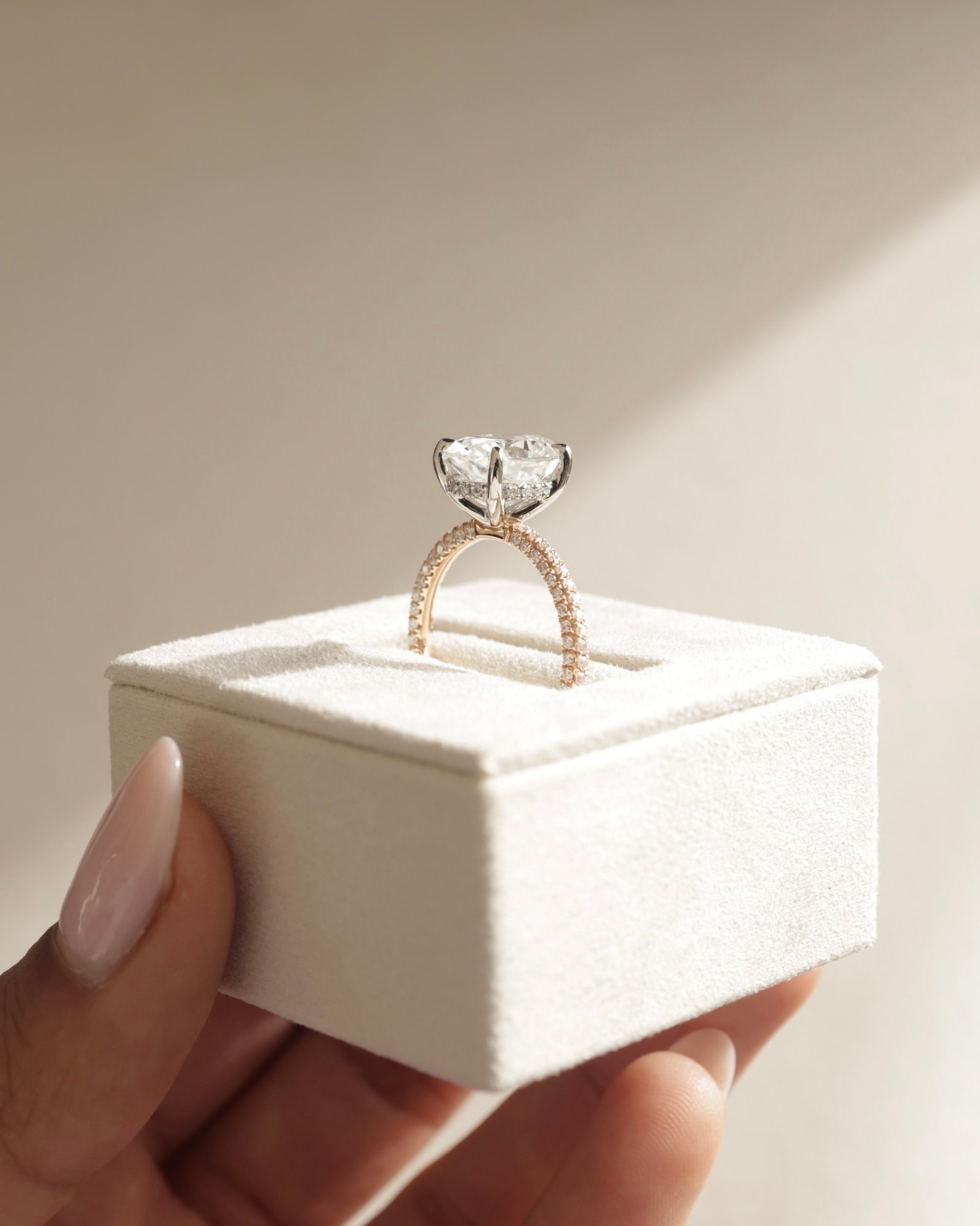 18k Rose Gold / Platinum | 11x8mm Oval Moissanite | Moissanite side stones